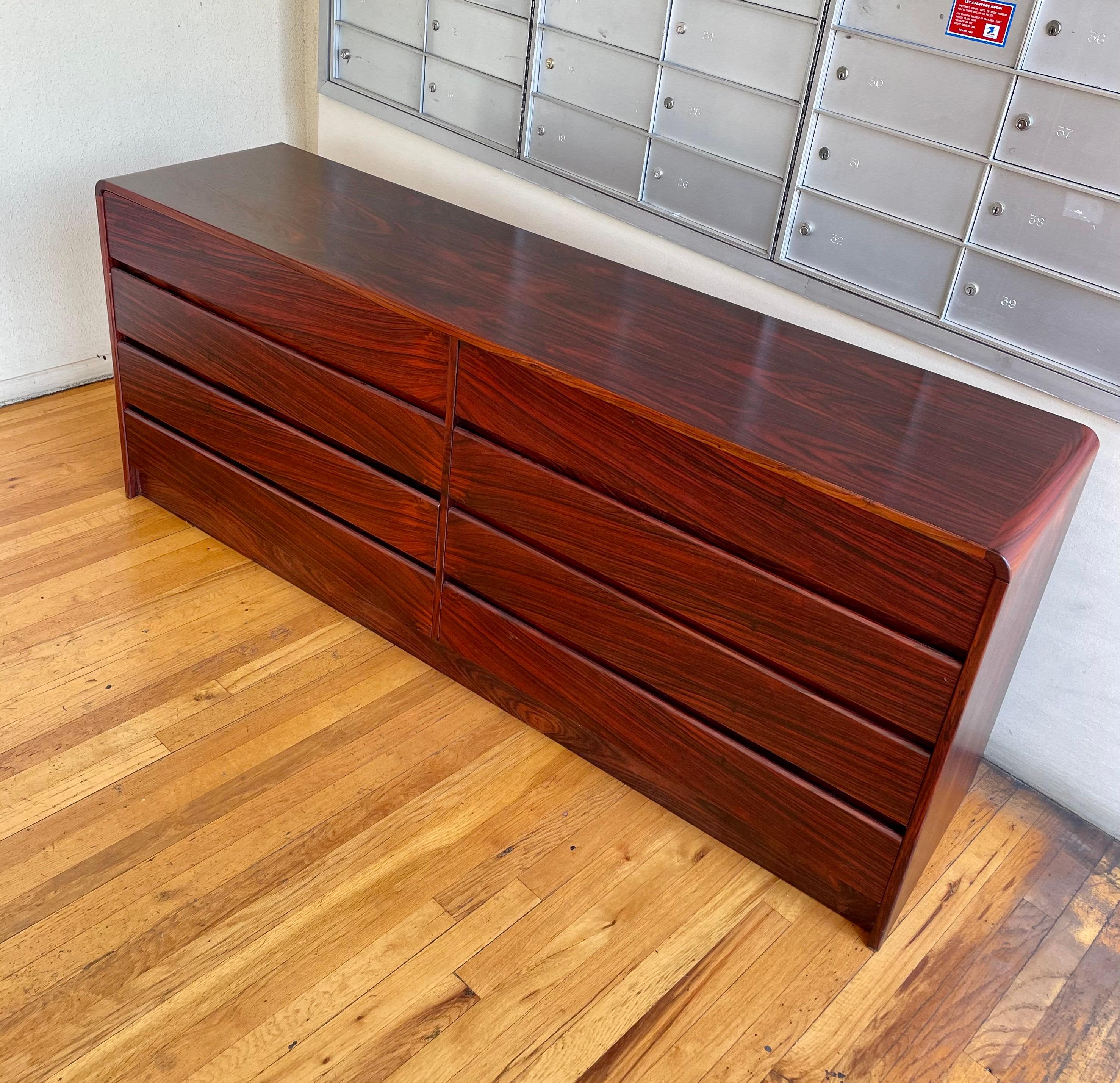 Beautiful 1980's striking 8 drawer dresser by Westnofa made in Denmark circa 1980s, very nice and clean condition circa 1980's we have oiled and cleaned the piece light marks on the piece due to age but overall very nice clean original finish and