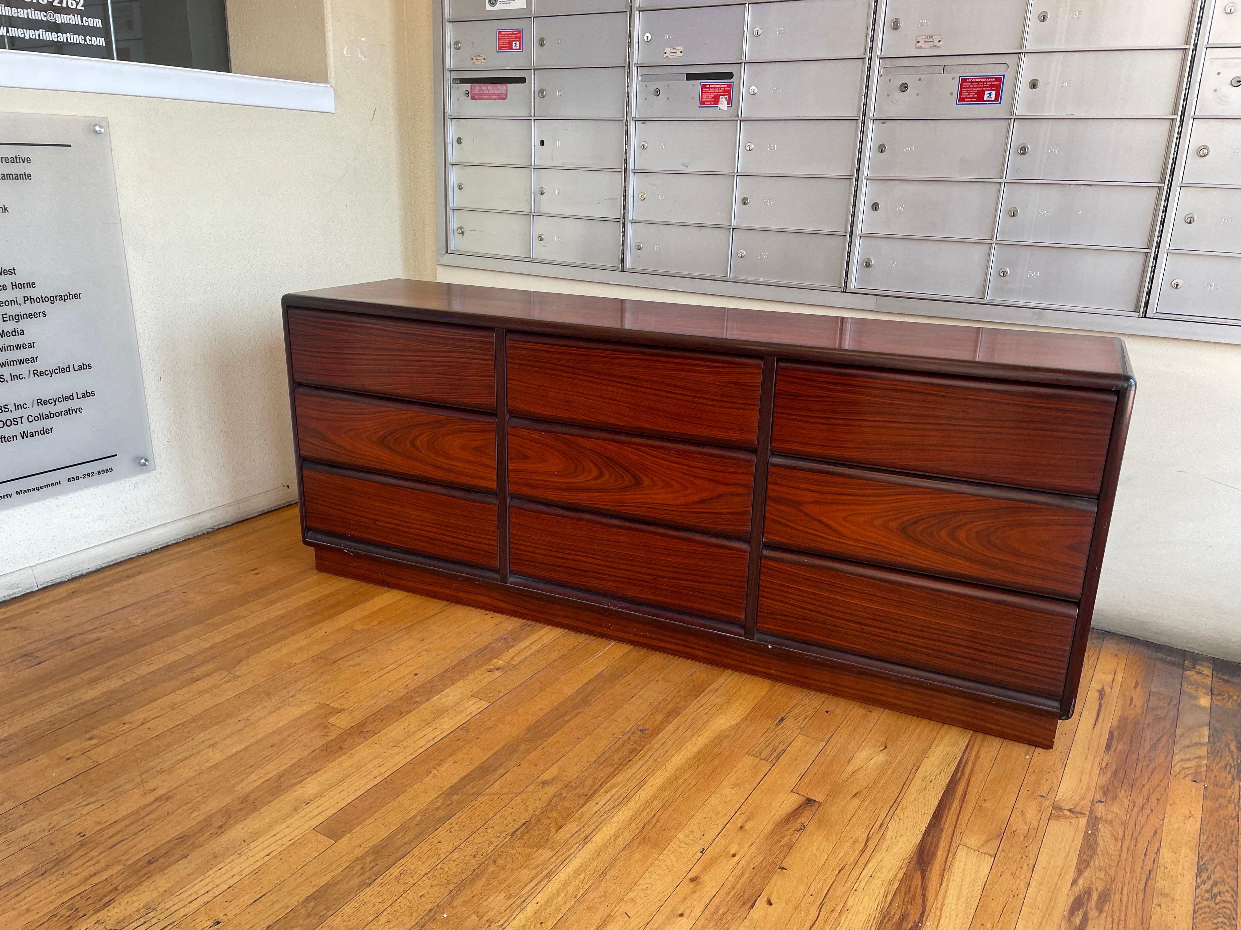 Beautiful 1980's striking 9 drawer dresser by Brouer made in Denmark circa 1980s, very nice and clean condition circa 1980's we have oiled and cleaned the piece light marks on the piece due to age but overall very nice clean original finish and