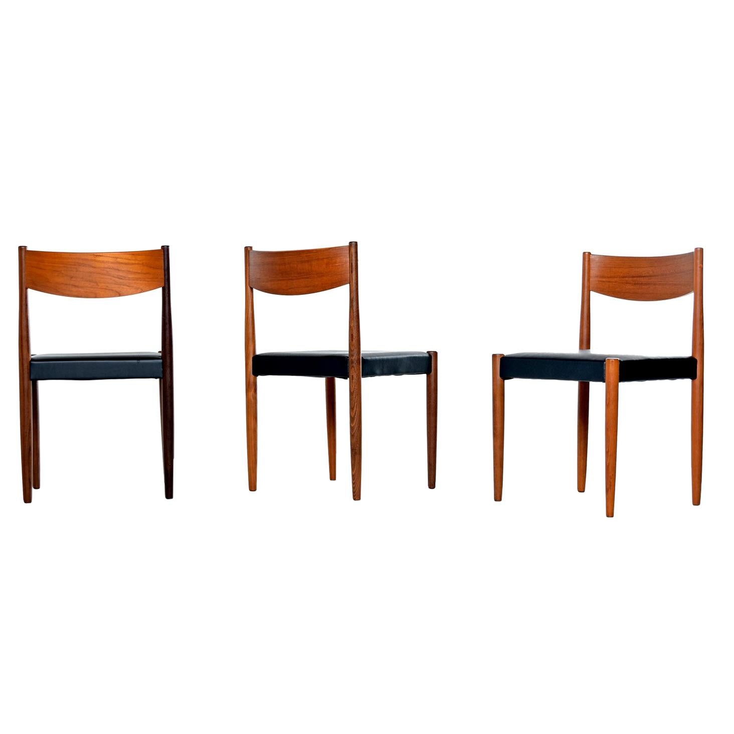 Fabulous group of six midcentury Danish modern teak and rosewood dining chairs. Graceful contouring in the teak backrest flows beautifully into the solid rosewood legs. Elegant minimalism and design at its best.

The restoration: The FMV team did