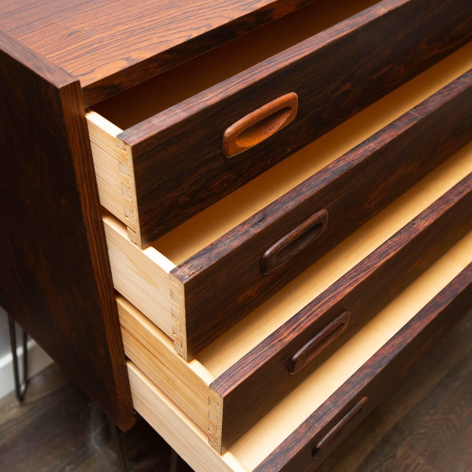 A nicely dovetail constructed four-drawer piece that's been updated with sturdy hairpin legs.