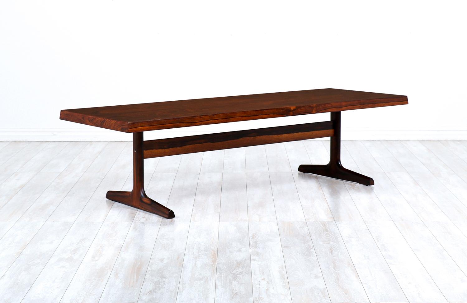 Danish modern rosewood coffee table by Dansk Design.