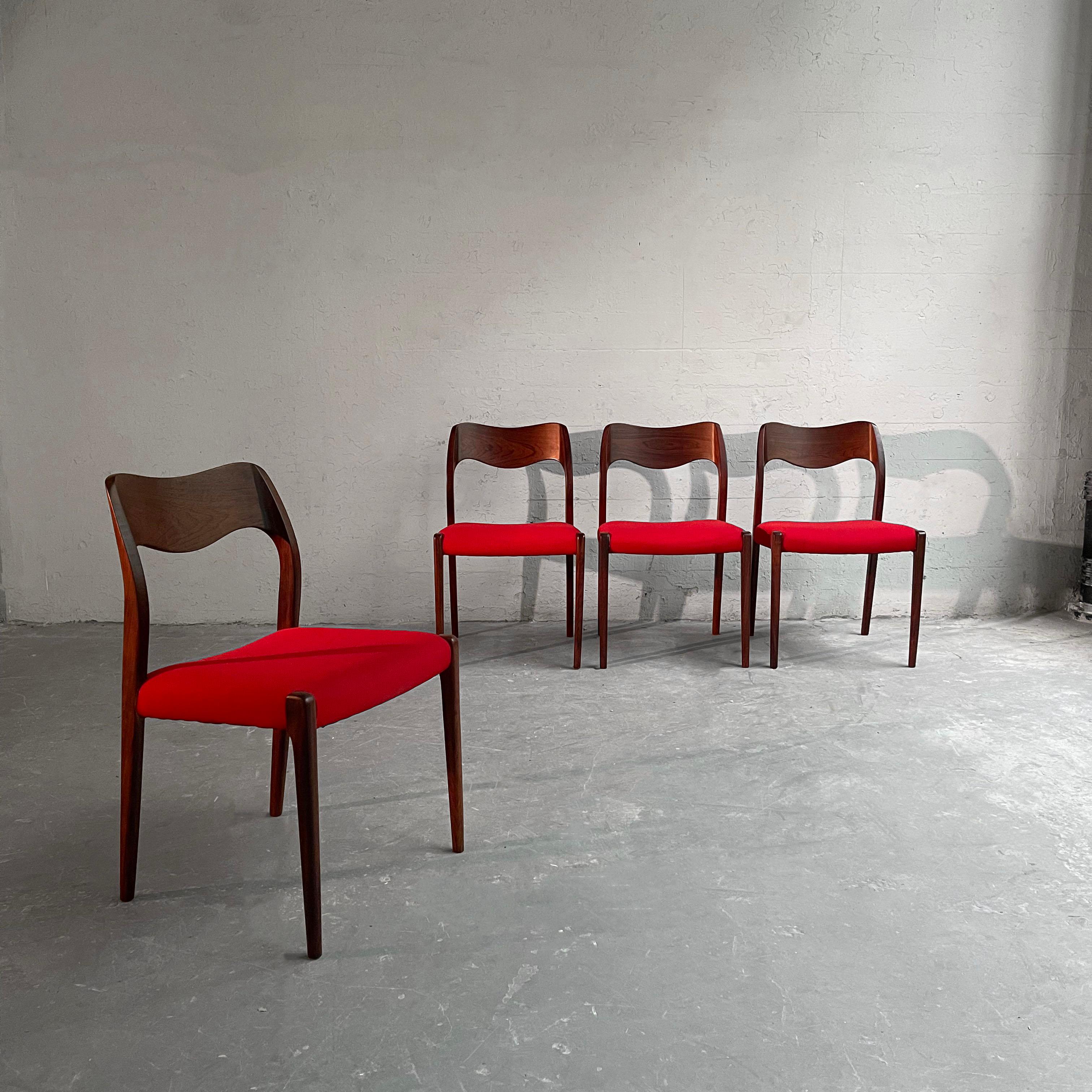 Set of 4 Danish modern, Model #71, rosewood dining chairs by Niels Otto Moller feature lipstick red wood blend upholstered seats.