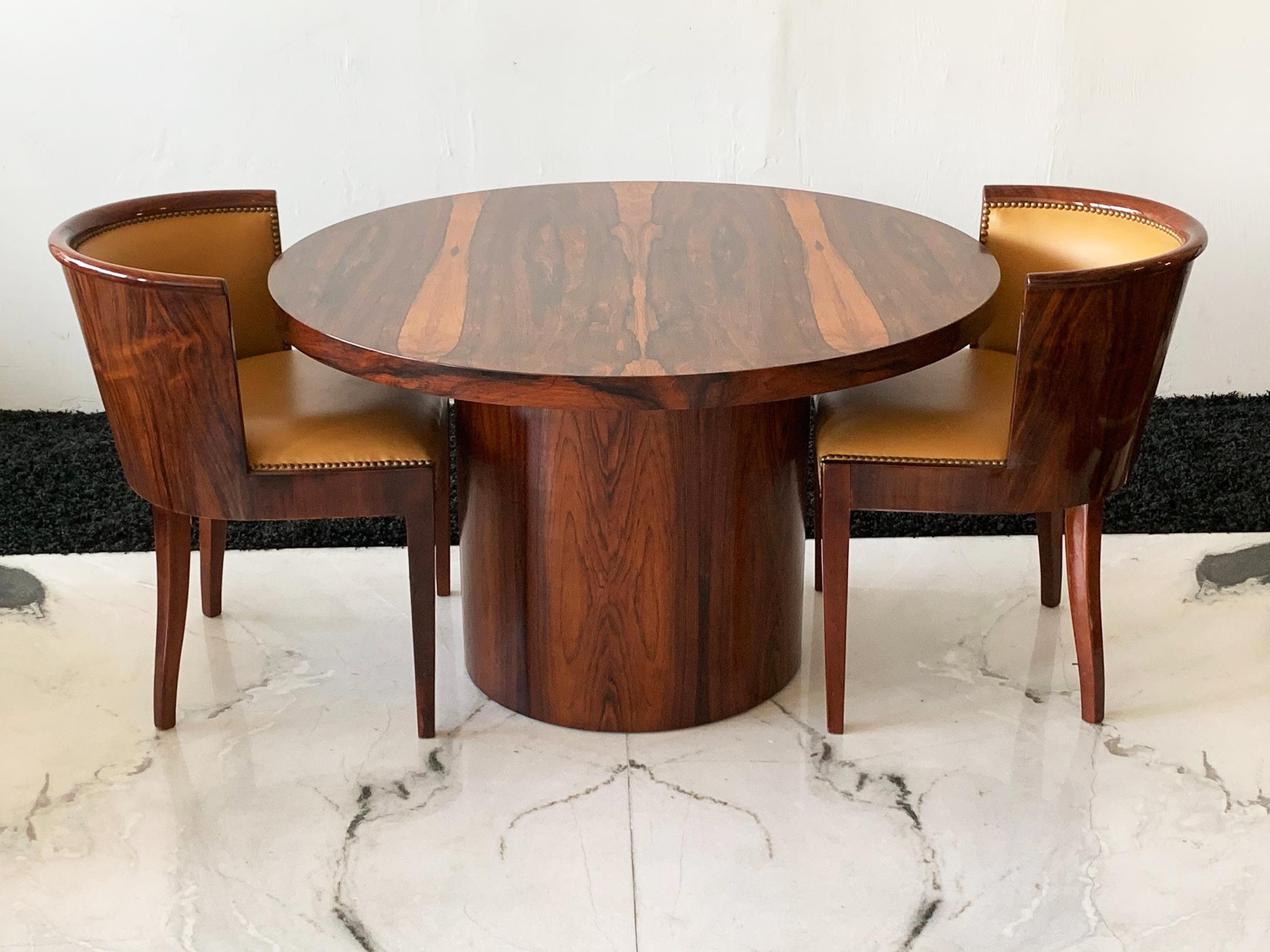 Available right now I have this stunning Danish modern rosewood dining or game table. This table is simply stunning! There is a breathtaking rosewood grain throughout on a great circular drum base.

This table measures a little lower than most