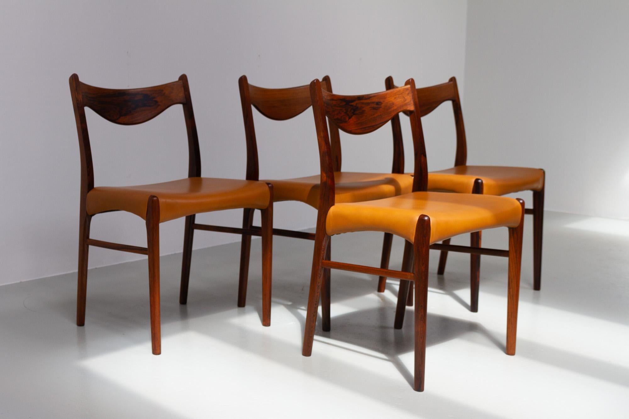 Danish Mid-Century Modern Rosewood/Palisander Dining Room Chairs GS61 by Arne Wahl Iversen for Glyngøre Stolefabrik, 1950s.

Beautiful Scandinavian Modern set of four GS 61 dining chairs designed in 1957 by Danish architect Arne Wahl Iversen for