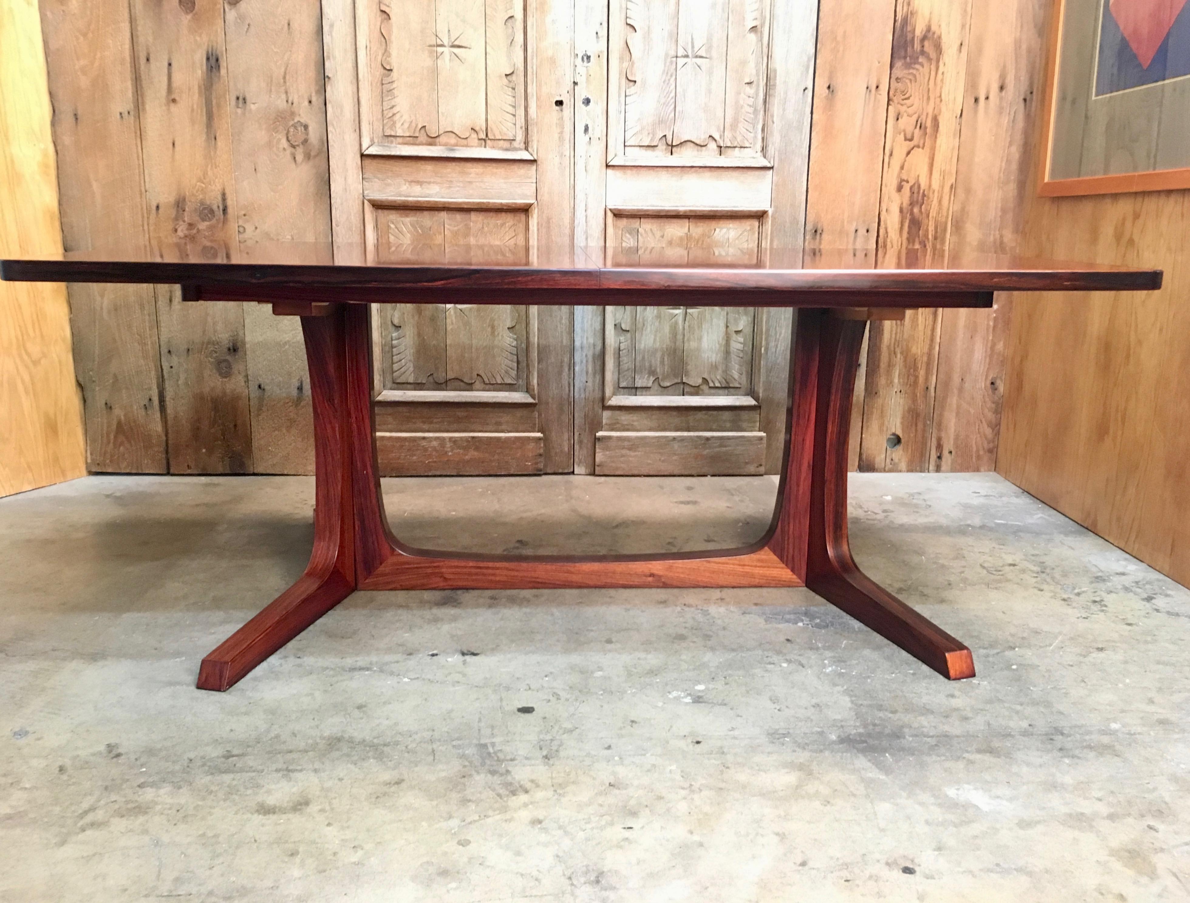 Midcentury rosewood dining table attributed to Danish designer Niels Otto Møller and produced by Gudme Möbelfabrik.
There are two original leaves that are darker then the table because of spending so much in the closet 

Chairs not included.