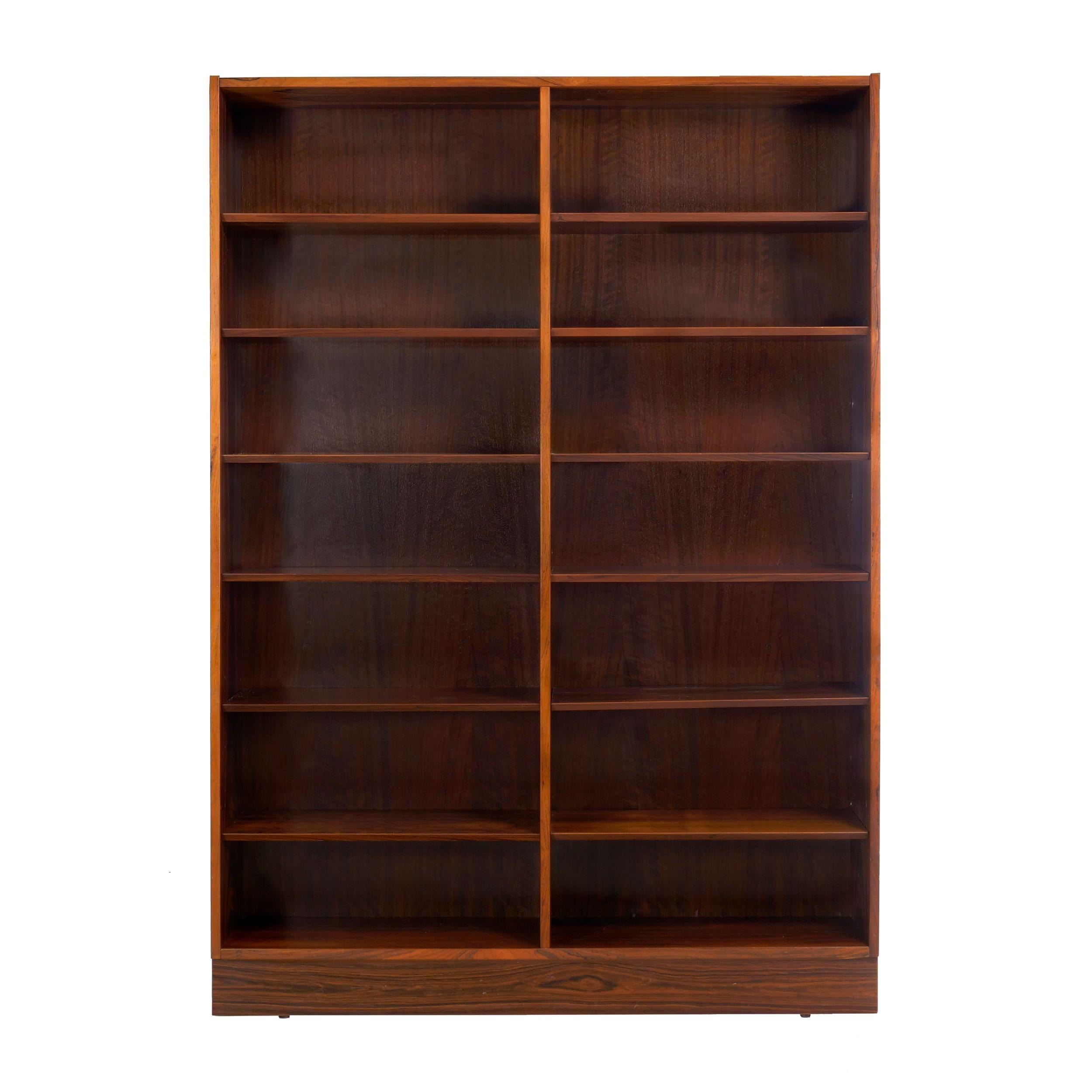 Danish modern rosewood double-bookcase by Poul Hundevad
Hundevad & Co / Danish Control label verso, circa 1960s
Item # 006EHP25P 

A very fine double-bookcase cabinet designed by Poul Hundevad and produced by his company during the 1960s, it is