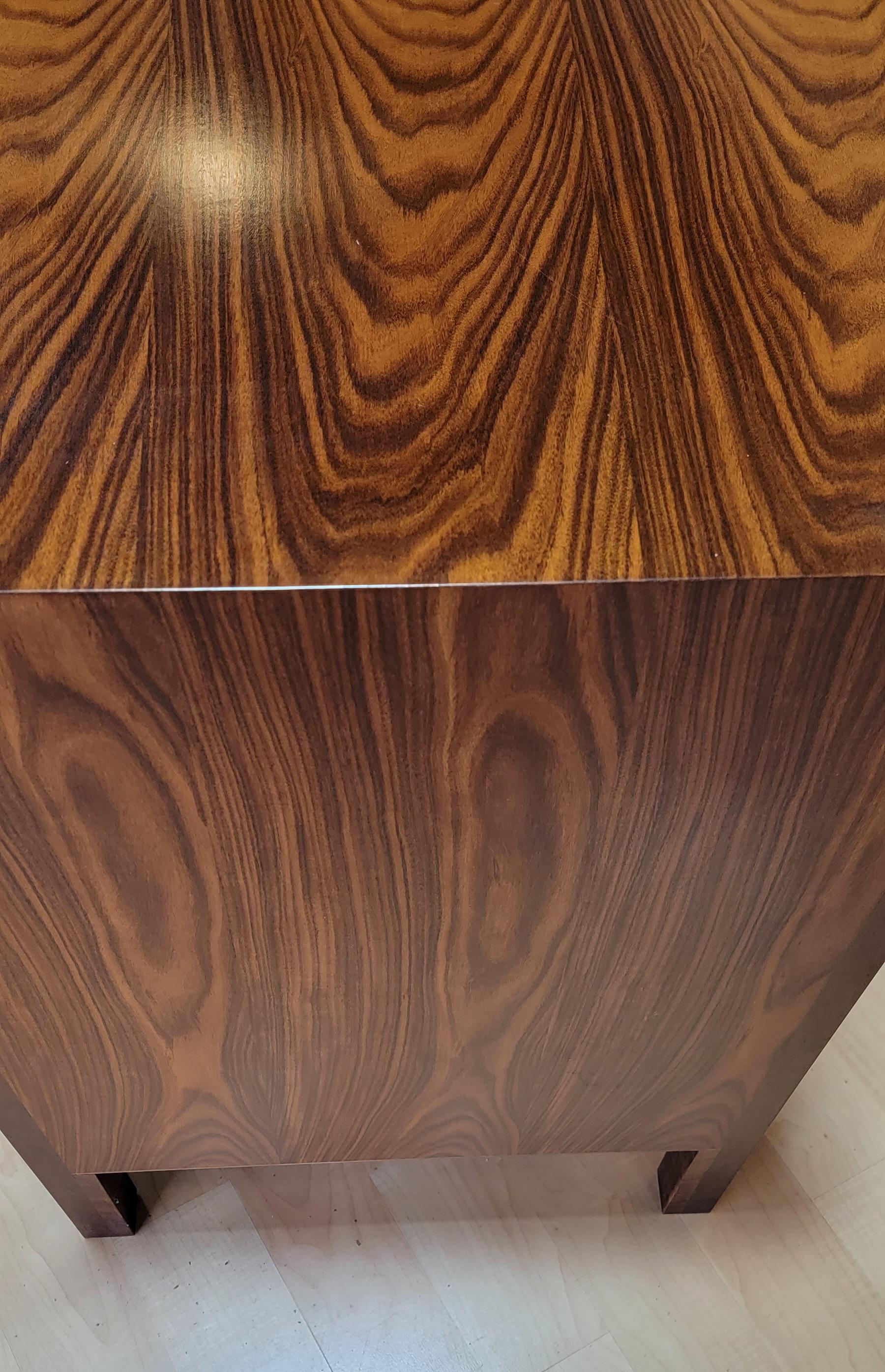 Exceptional wood grain pattern to this very attractive long low, 6 drawer rosewood dresser. Measuring just under 79 inches wide. Original finish glows with a rich, deep patina. Dovetail construction to drawers. 