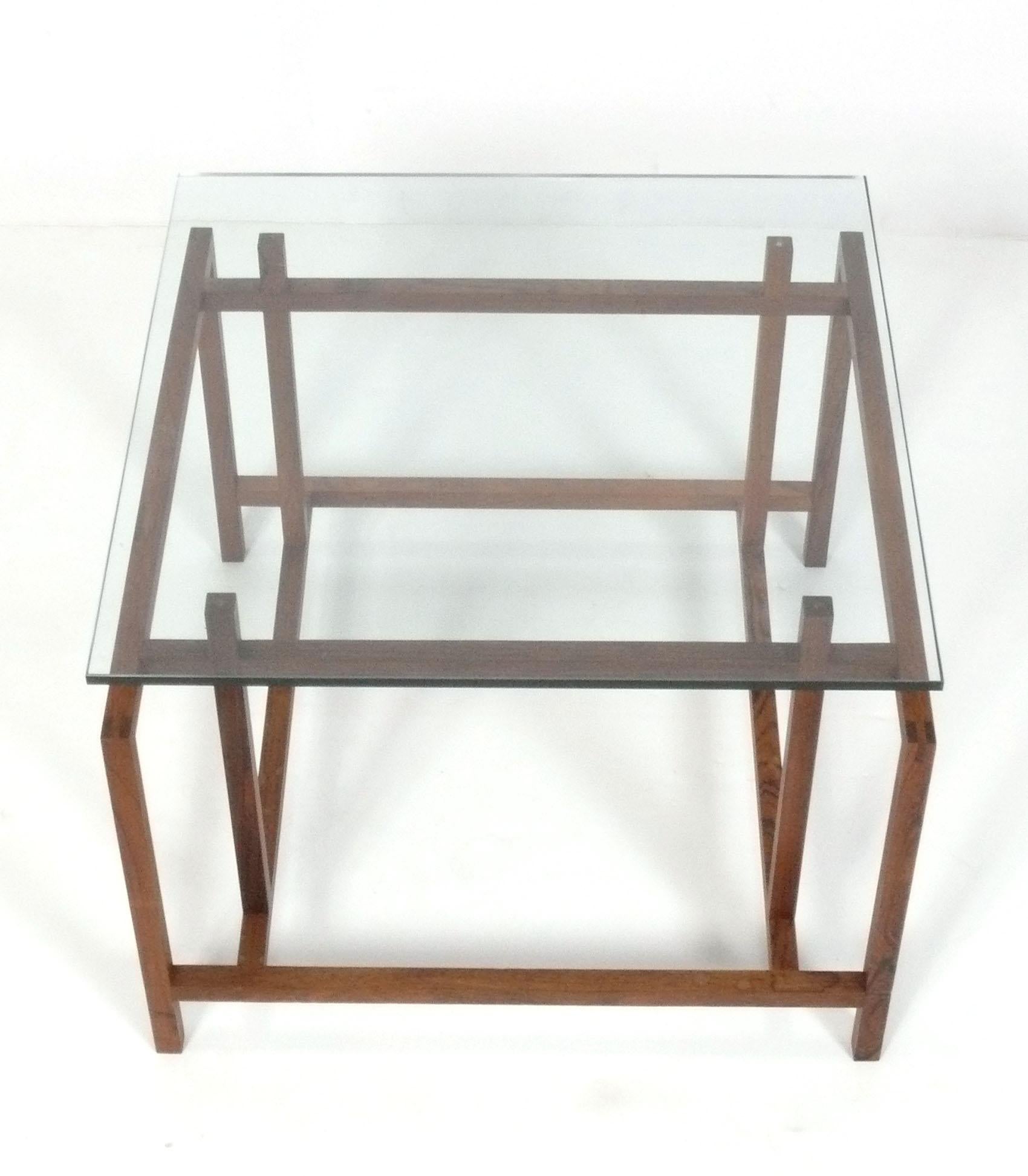 Clean Lined Architectural Rosewood Table, designed by Henning Norgaard for Komfort, Denmark, circa 1960s. It is a versatile size and can be used as a side or end table, night stand, or coffee table.