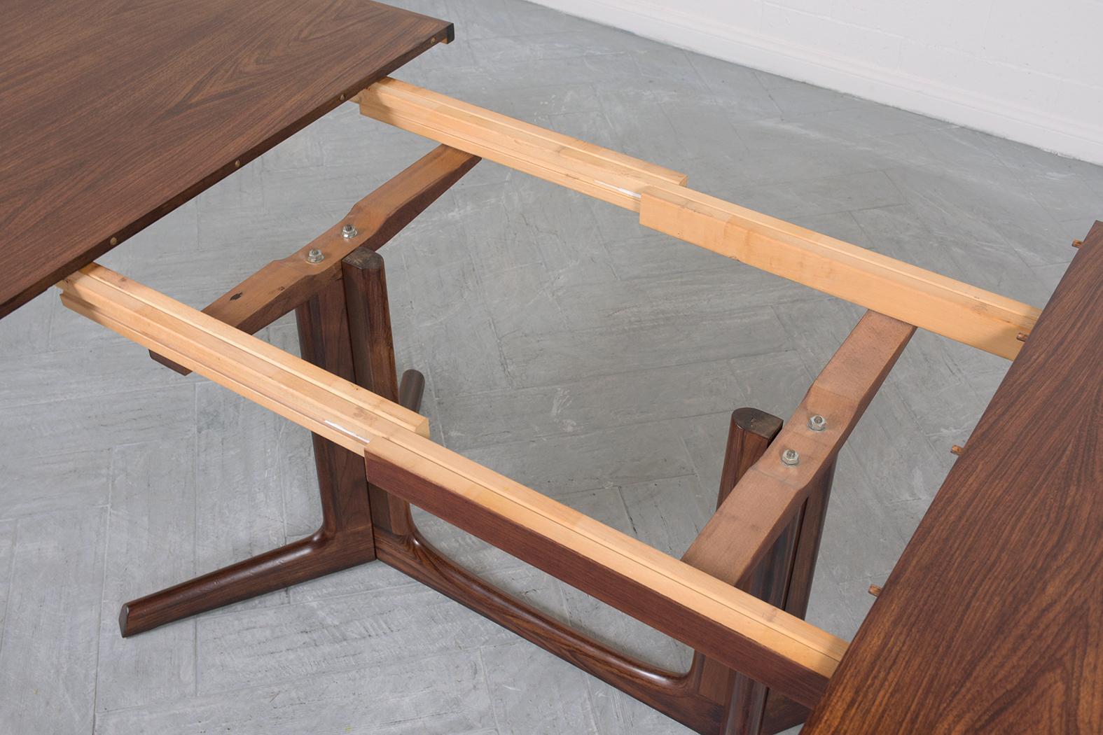 Mid-20th Century Danish Modern Rosewood Extendable Dining Table