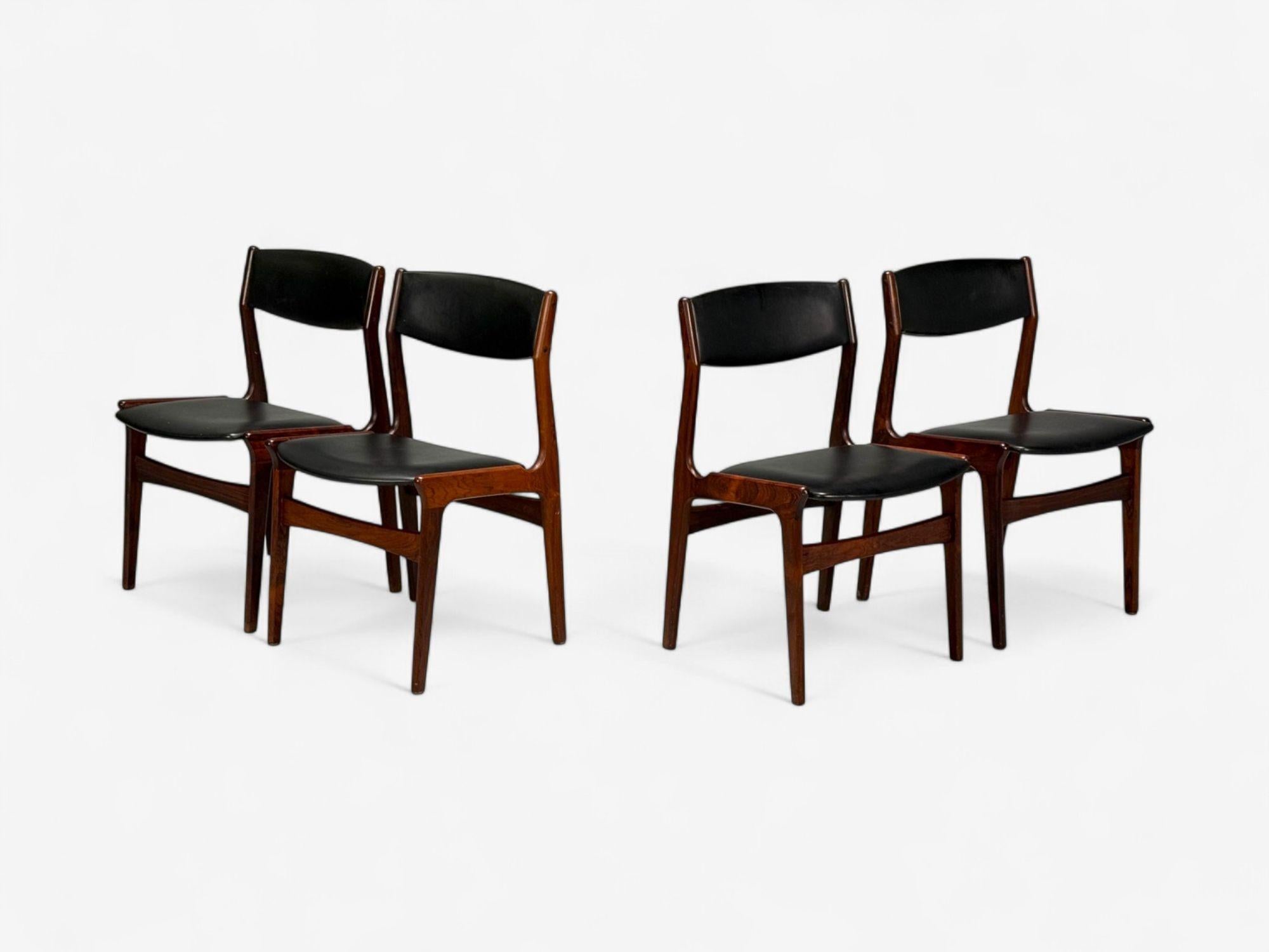 Danish Mid-Century Modern, Rosewood, Leatherette, Dining or Side Chairs, Denmark, 1950s

Set of four Danish modern rosewood and leatherette side or dining chairs designed and produced in Denmark c. 1950s. A matching extendable Danish rosewood dining