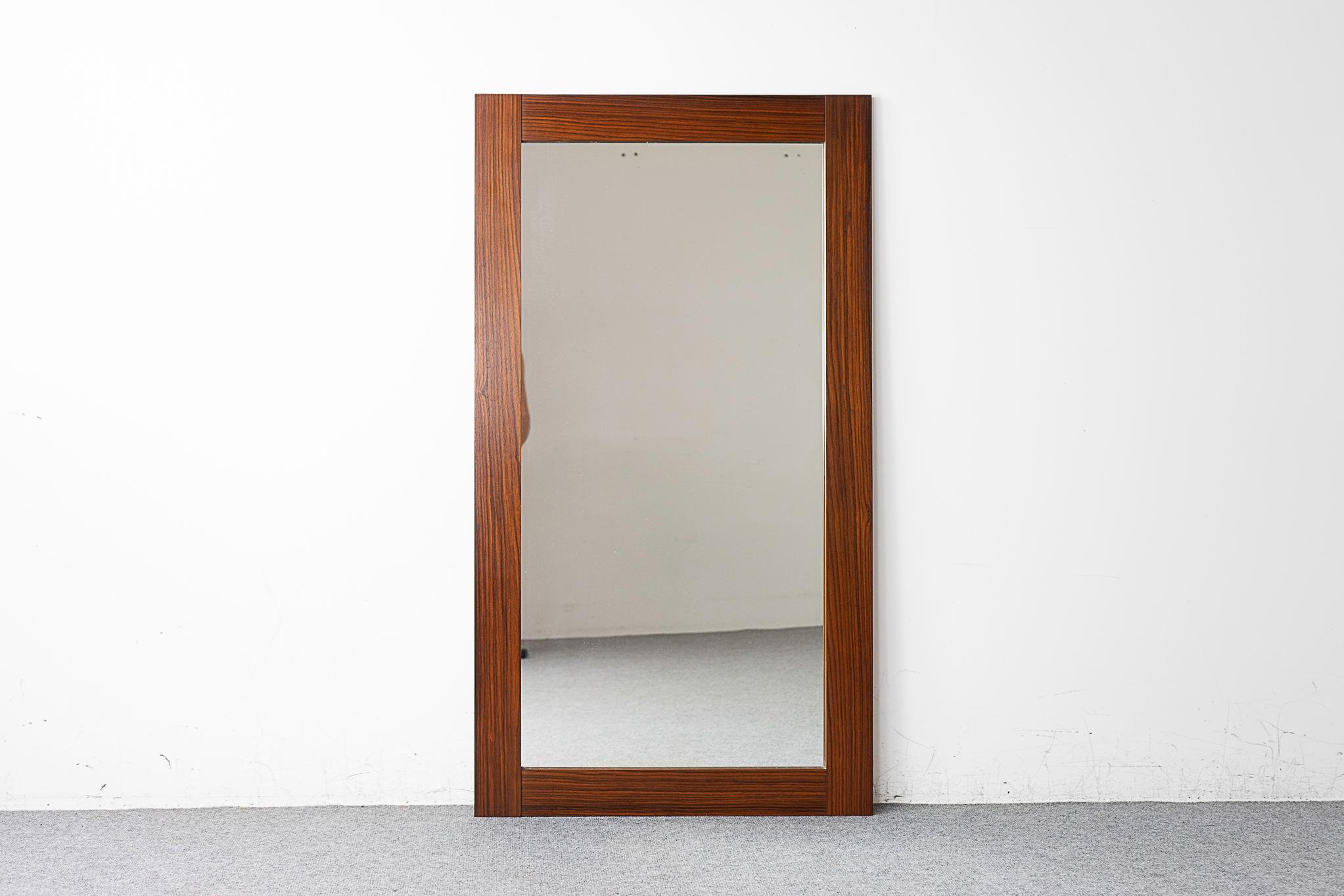Rosewood mid-century mirror, circa 1960's. Substantial mirror to check your full outfit! Nice grain patterns, original glass is in nice condition, tiny bit of cloudiness. 