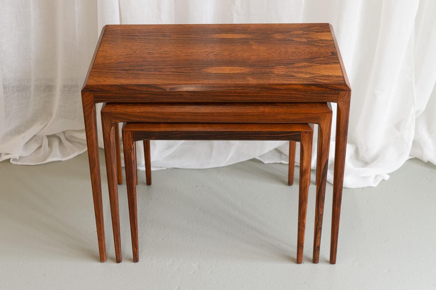 Danish Modern Rosewood Nesting Tables by Johannes Andersen for CFC, Silkeborg 1960s. Set of 3.

Beautiful set of three Scandinavian Mid-Century Modern side tables that perfectly nets inside each other.
Designed by Danish designer Johannes Andersen