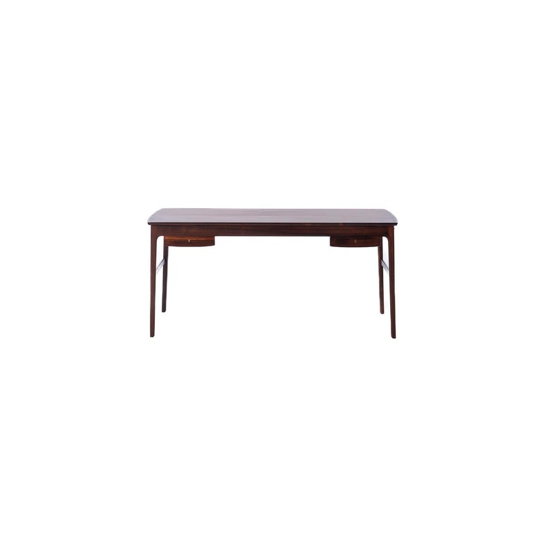 Danish modern Rosewood writing desk designed by Ole Wanscher. Produced by master cabinetmaker A.J. Iversen.


Professional, skilled furniture restoration is an integral part of what we do every day. Our goal is to provide beautiful, functional