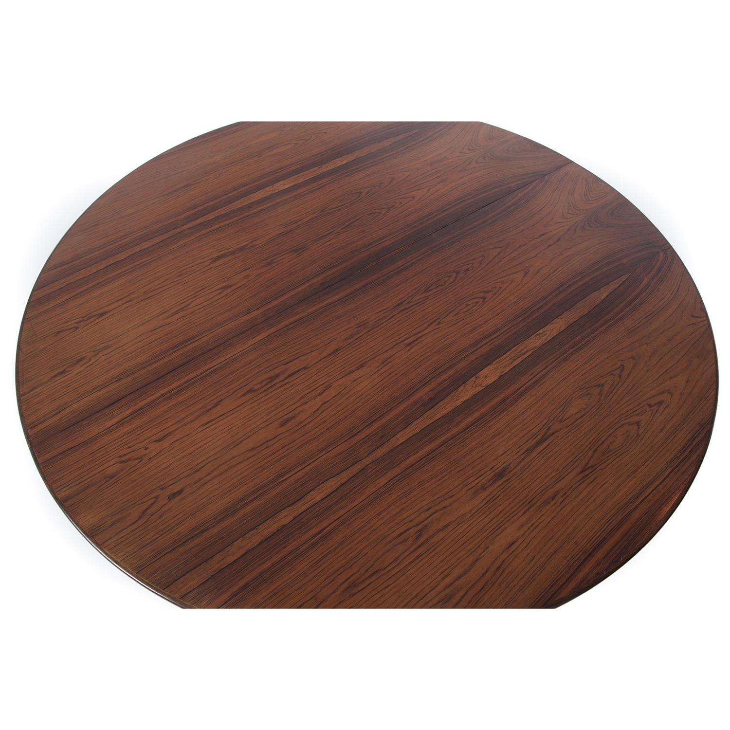 Scandinavian Modern Danish Modern Rosewood Round to Oval Dining Table with Two Leaves