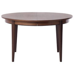 Danish Modern Rosewood Round to Oval Dining Table with Two Leaves