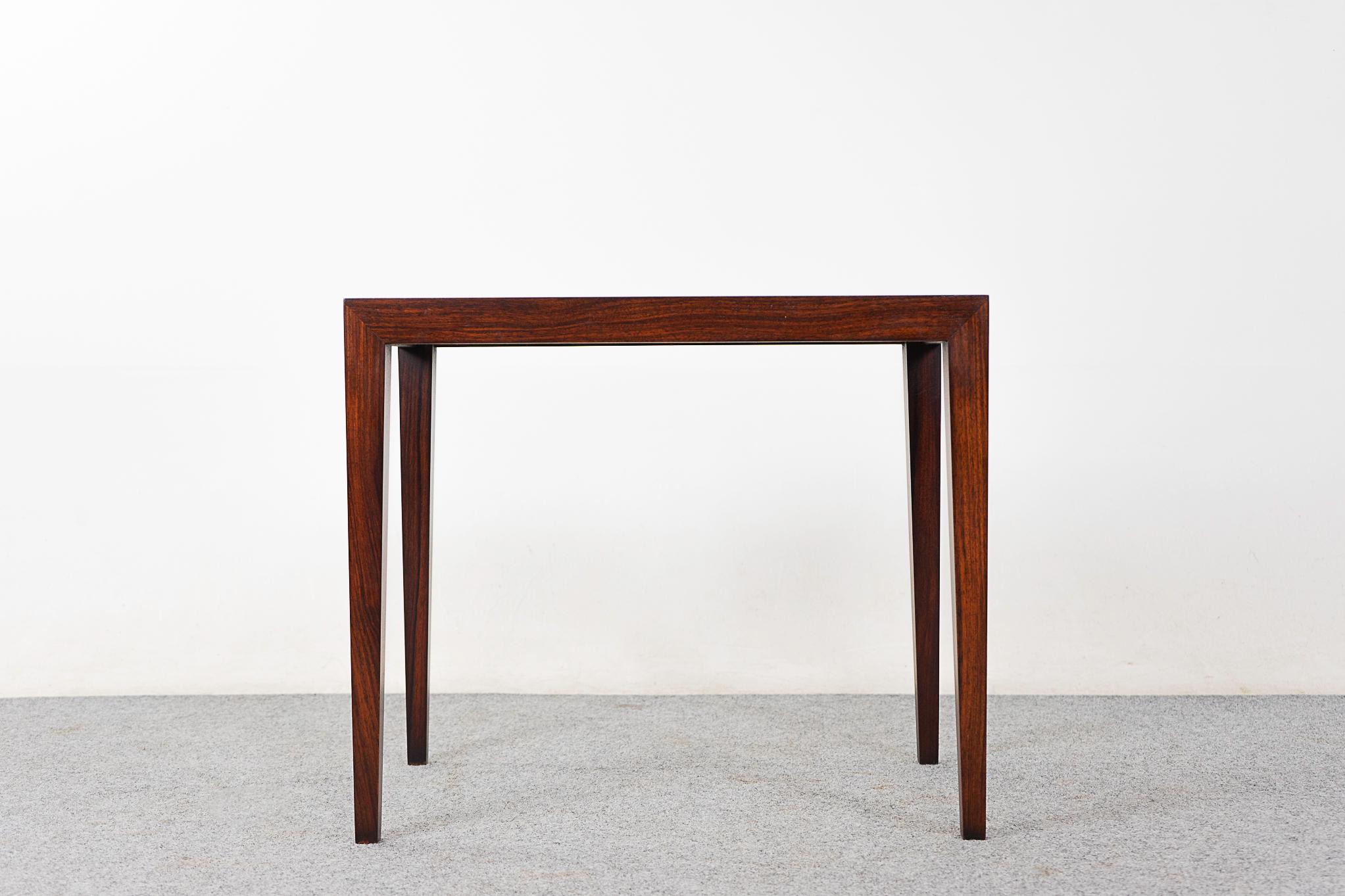 Rosewood mid-century side table by Haslev, circa 1960's. Compact, highly functional table with beautiful corner joinery. Deep rich color and long legs! 