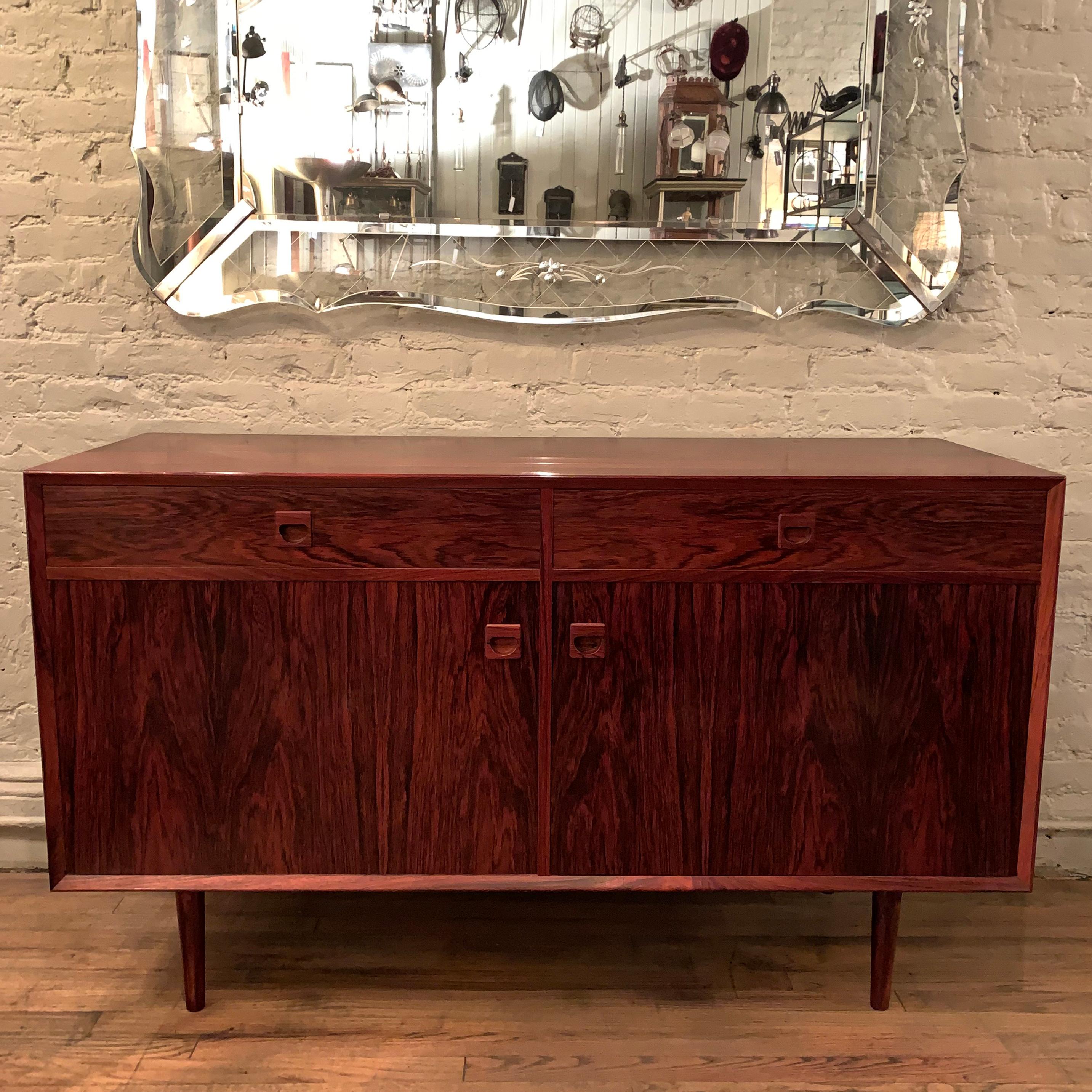 Neatly sized, Danish modern, rosewood sideboard / credenza by E. Brouer for Brouer Møbelfabrik features top drawer and cabinet storage below.