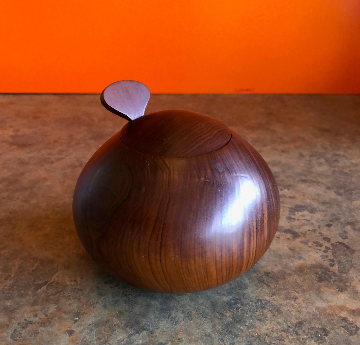 Beautiful Danish modern rosewood sugar bowl with spoon and lid, circa 1970's. The bowl measures 3
