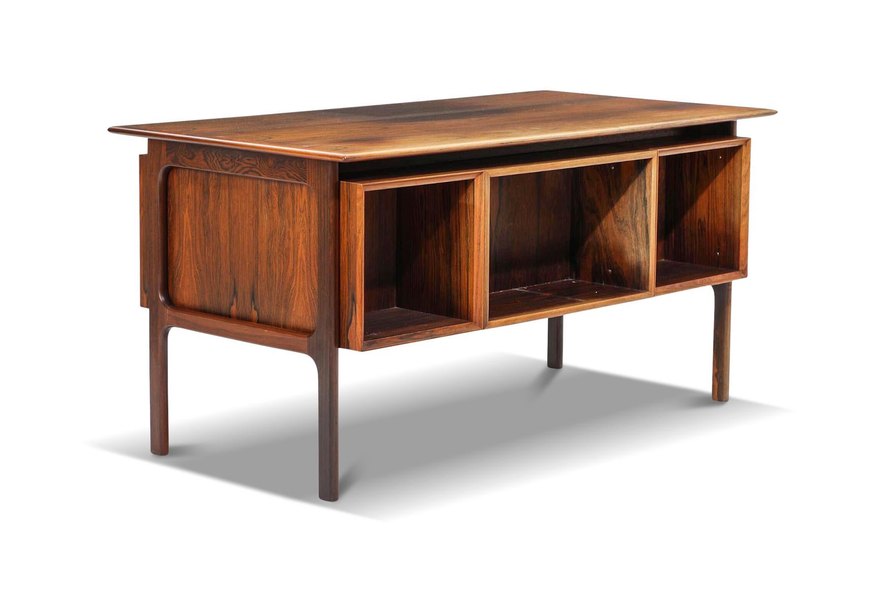 Origin: Denmark
Designer: Arne Vodder
Manufacturer: Brouer
Era: 1960s
Materials: Rosewood
Measurements: 57? wide x 29.5? deep x 28.3? tall

Condition:
In excellent original condition with light cosmetic wear. Price includes refinishing.