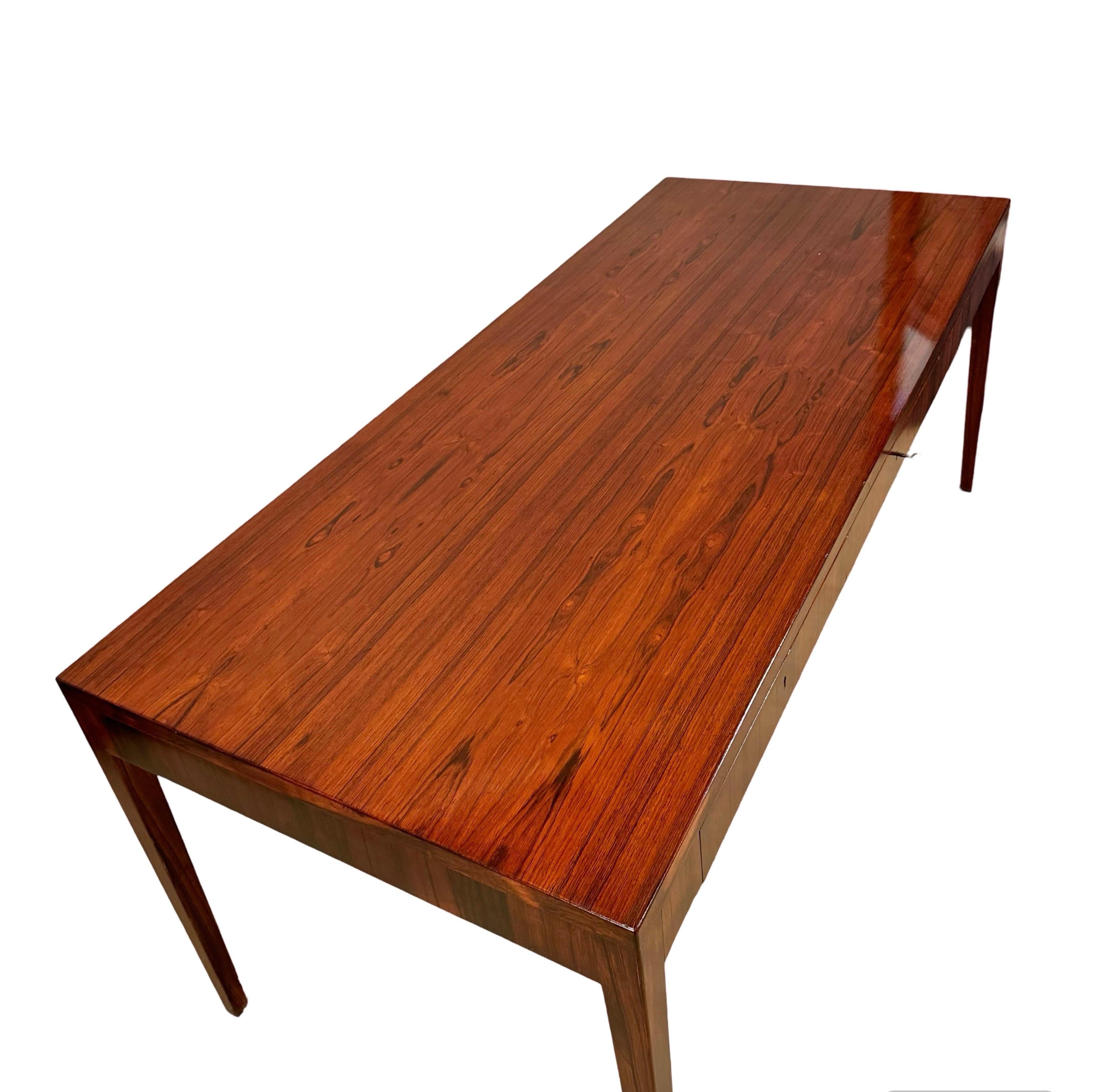 Danish Modern Rosewood Desk 

Finish in great condition Desk has 1 key 
