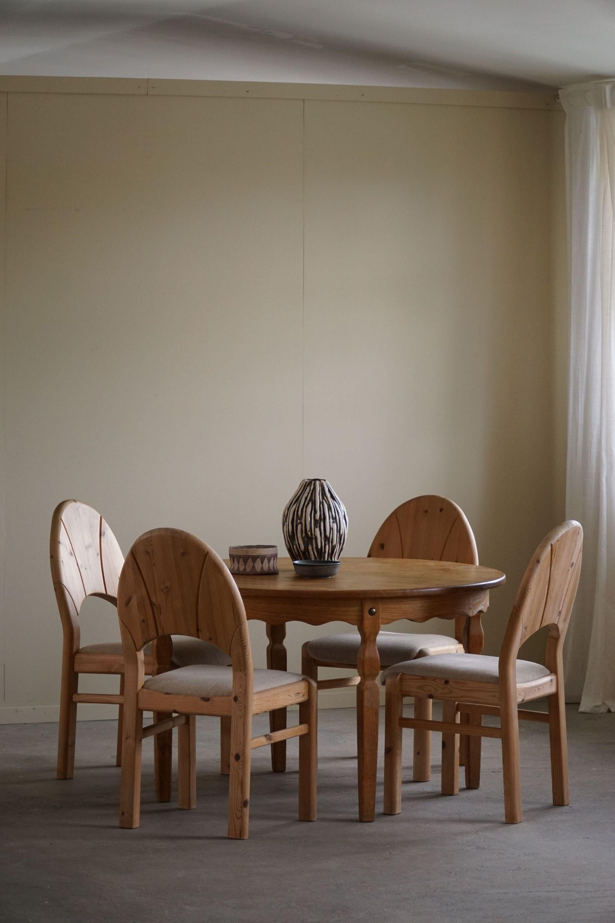 Classic round dining table in solid oak with two extensions, made in the 1960s Rosengaarden, Denmark. Stamped underneath. Such a sculptural figure for the modern interior.

Curved legs and great craftmanship in this brutalist table. 
Light signs of