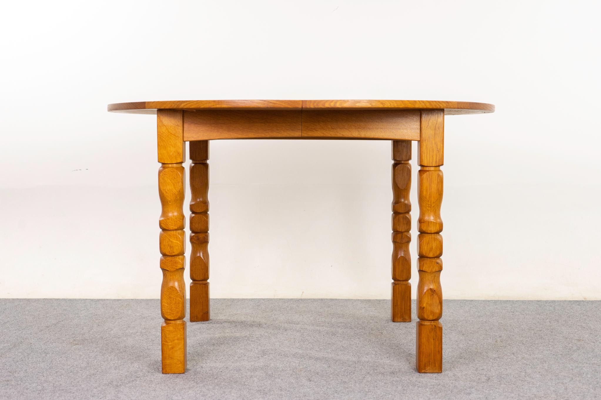 Oak dining table by Soro Stole, circa 1960s. Strikingly carved solid legs and extendable top. Soro Stole's maker's mark intact.

45.5