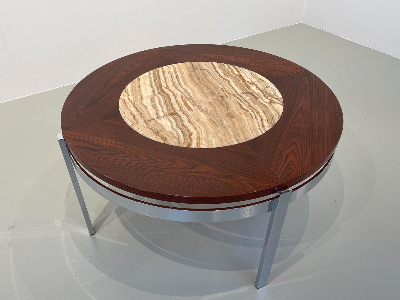 Danish Modern Round Rosewood and Marble Coffee Table by Bendixen Design, 1970s.
Stunning circular coffee table designed and manufactured by Bendixen Design Denmark.
Circular frame in chromed steel with four square legs. Floating table top in