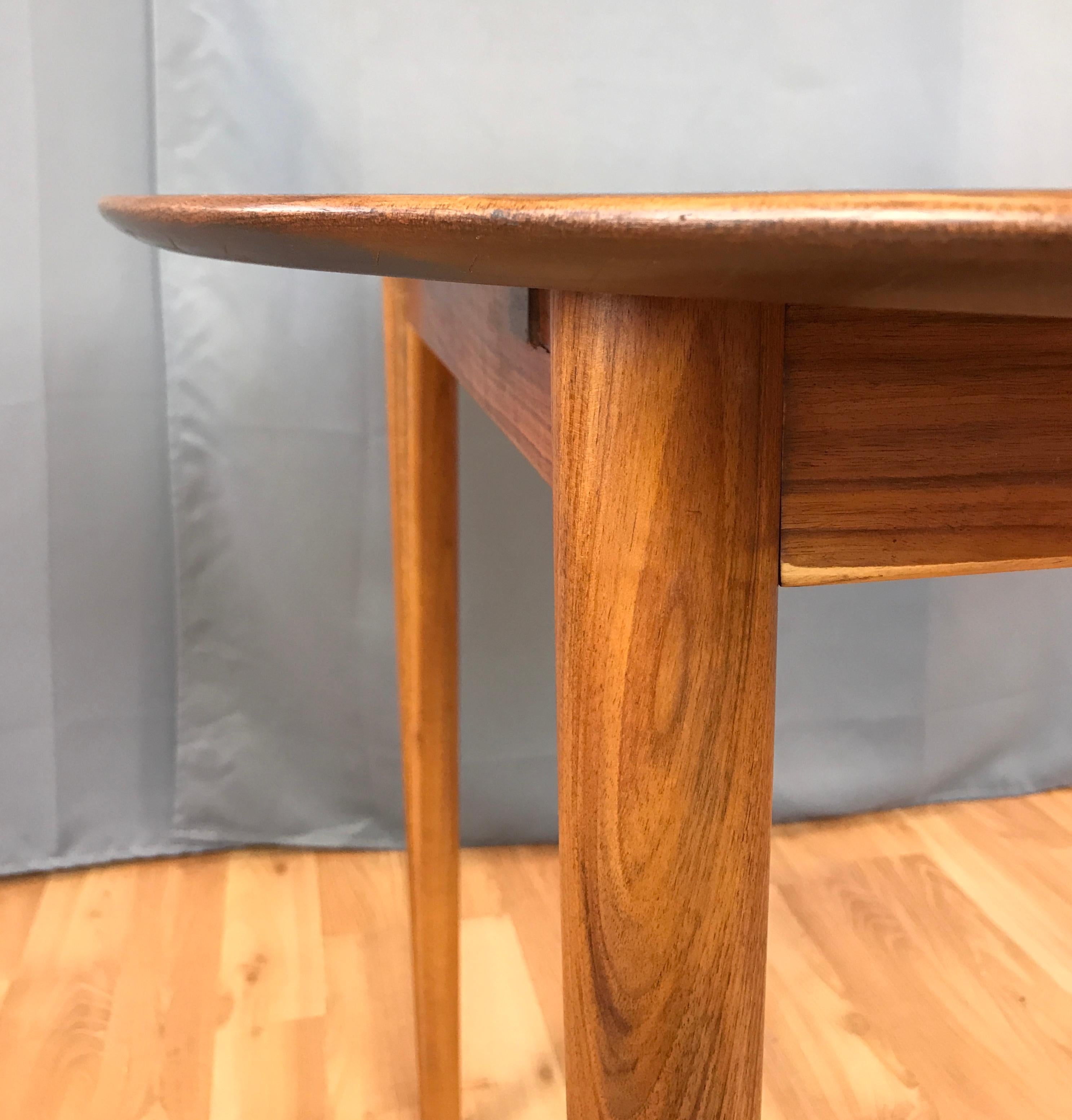 Mid-20th Century Danish Modern Round Rosewood Dining Table by Kurt Ostervig