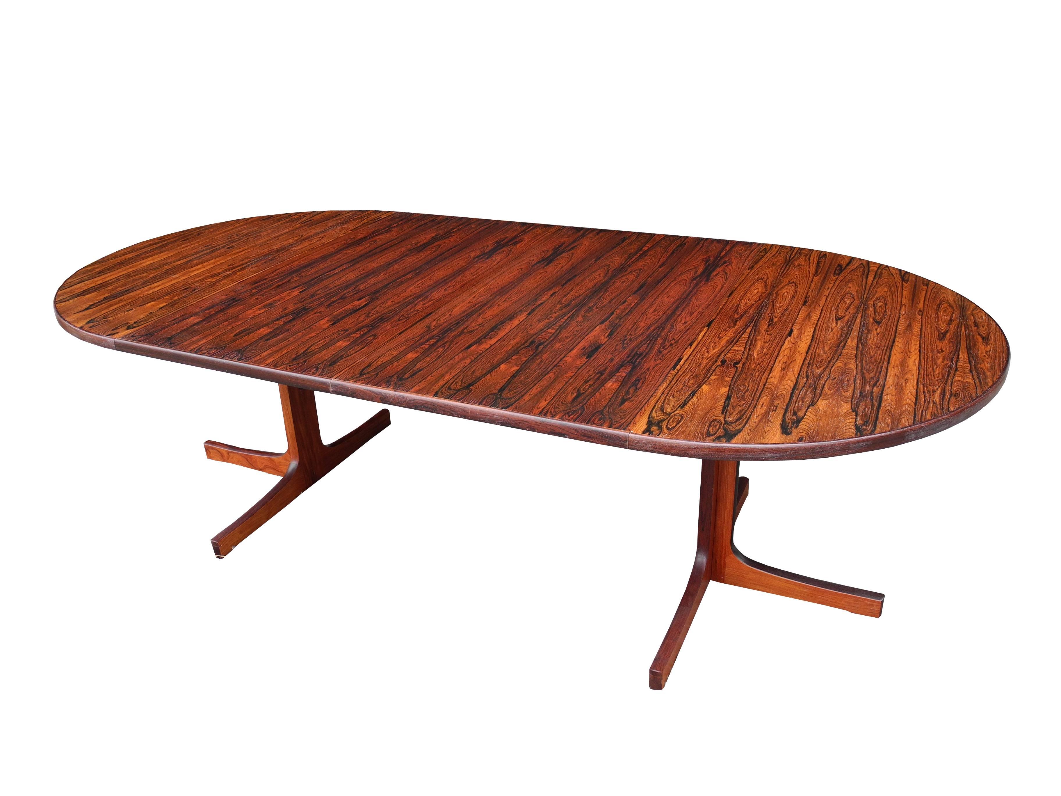 This rosewood dining table was made in Denmark by Niels O Møller in the 1960s. The table has two extension leaves. Closed it is a 48