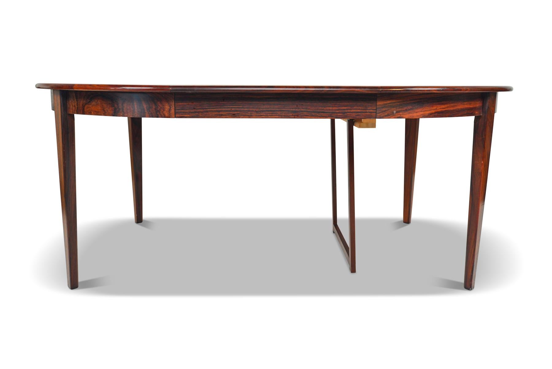 20th Century Danish Modern Round Rosewood Table with Three Leaves by Moreddi