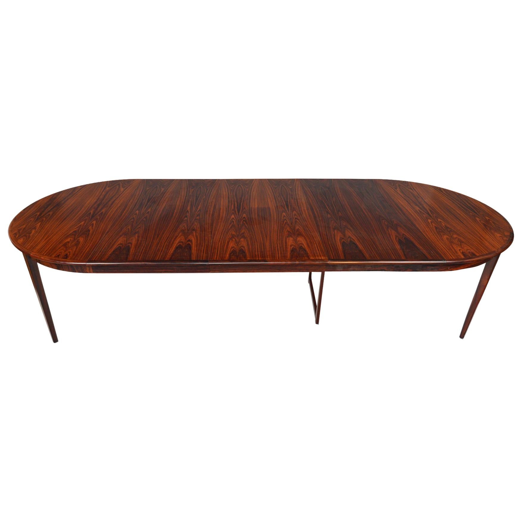 Danish Modern Round Rosewood Table with Three Leaves by Moreddi