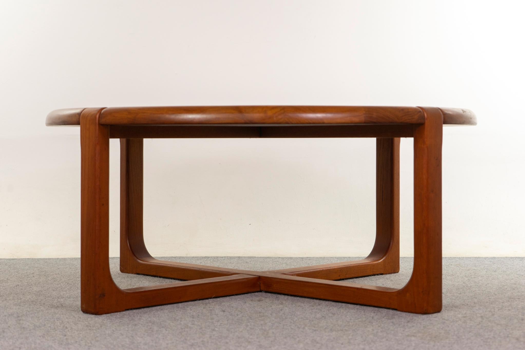 Teak Danish coffee, circa 1970s. Robust design, crafted from solid teak. Unique edging and legs, generously proportioned. 

Unrestored item with option to purchase in restored condition for an additional $250 USD. Restoration includes: repairs,
