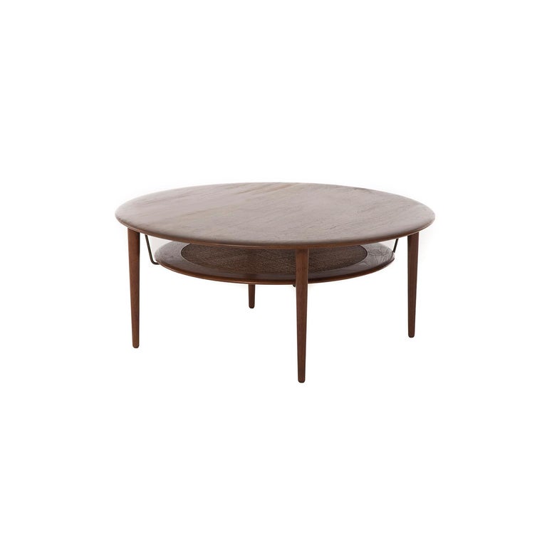 Danish Modern Round Teak Coffee Table With Floating Rattan Shelf At 1stdibs Danish Modern Round Teak Coffee Table, Round Coffee Table With Bookshelf