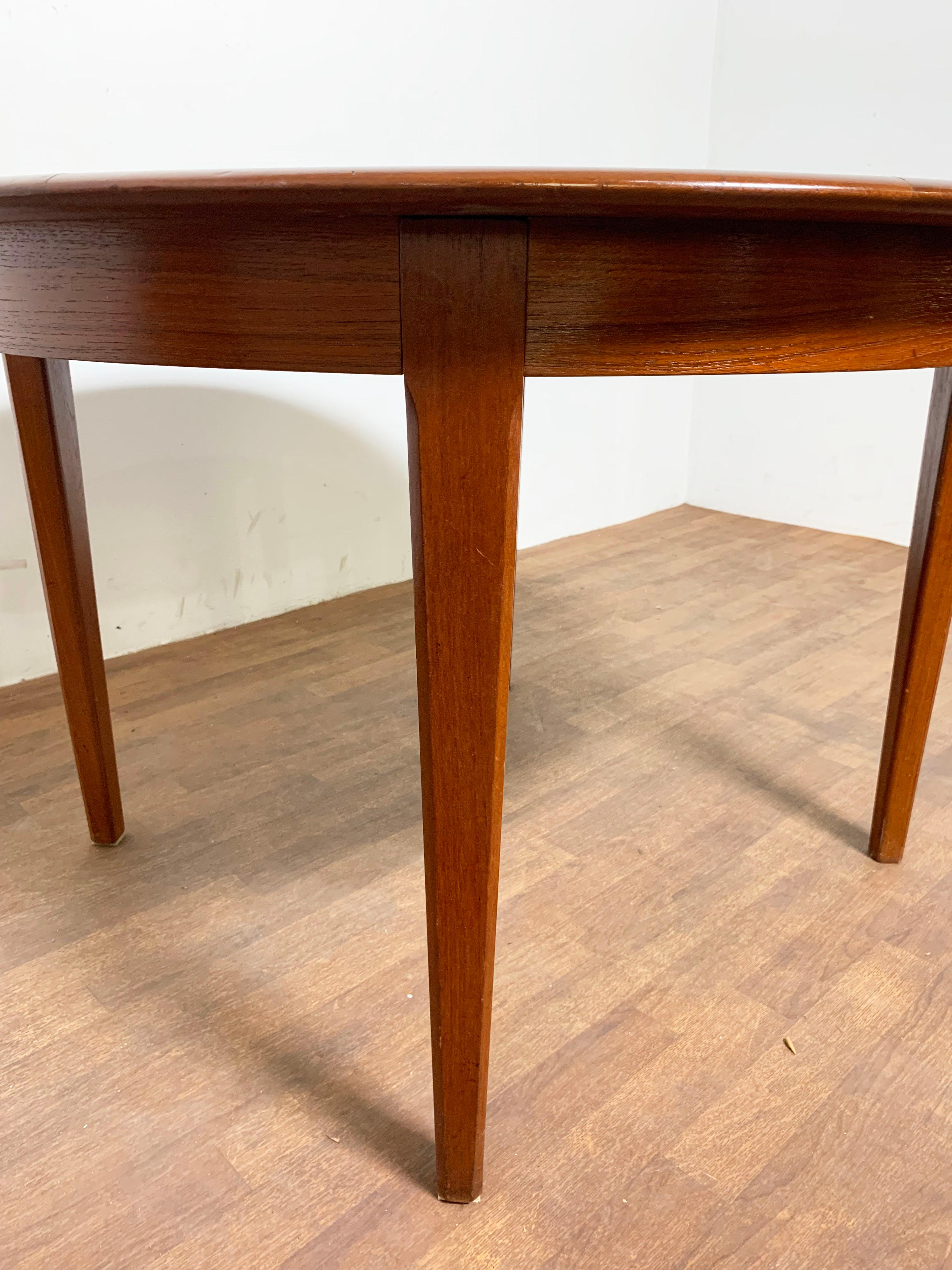 Danish Modern Round Teak Dining Table with Two Leaves, Circa 1960s 5