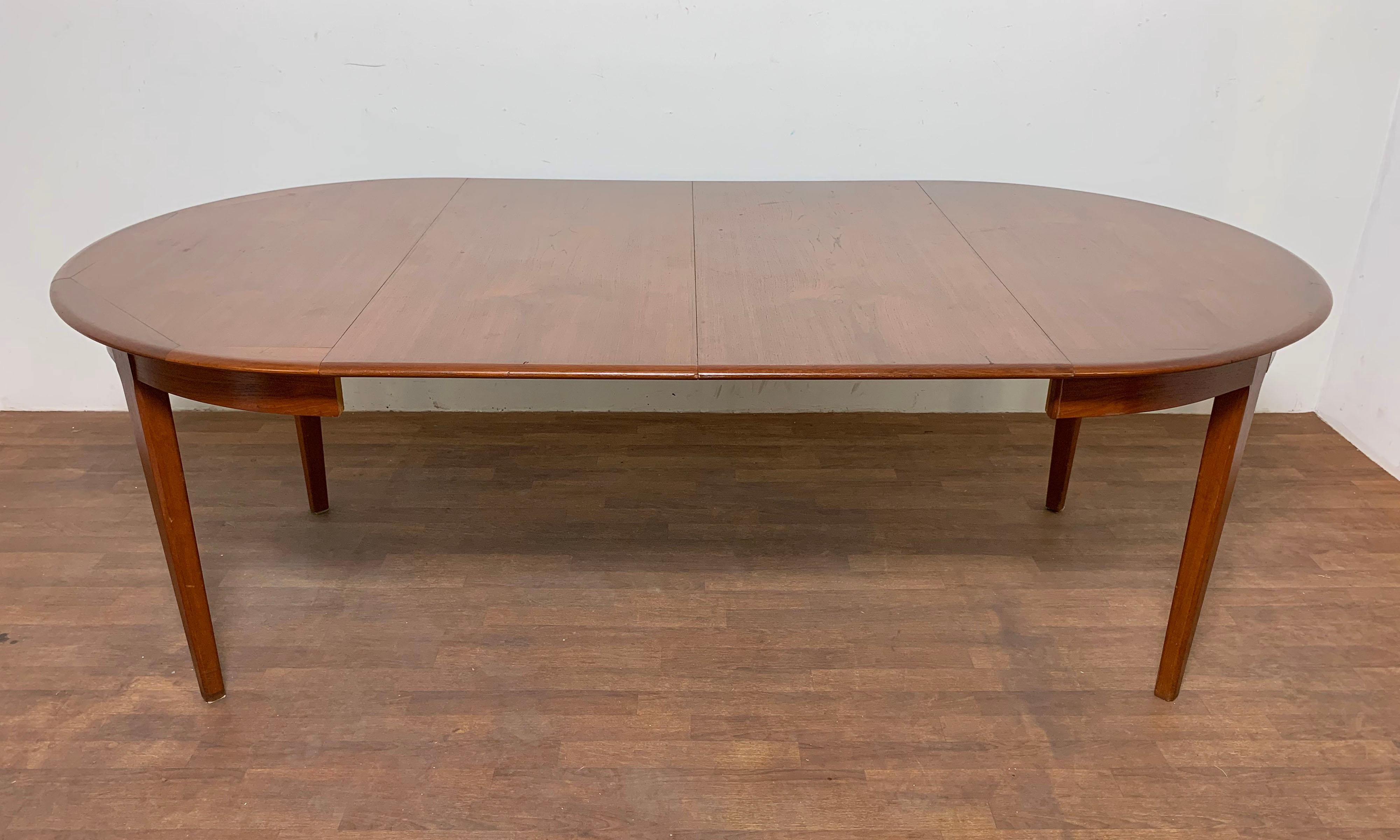 Swedish Danish Modern Round Teak Dining Table with Two Leaves, Circa 1960s