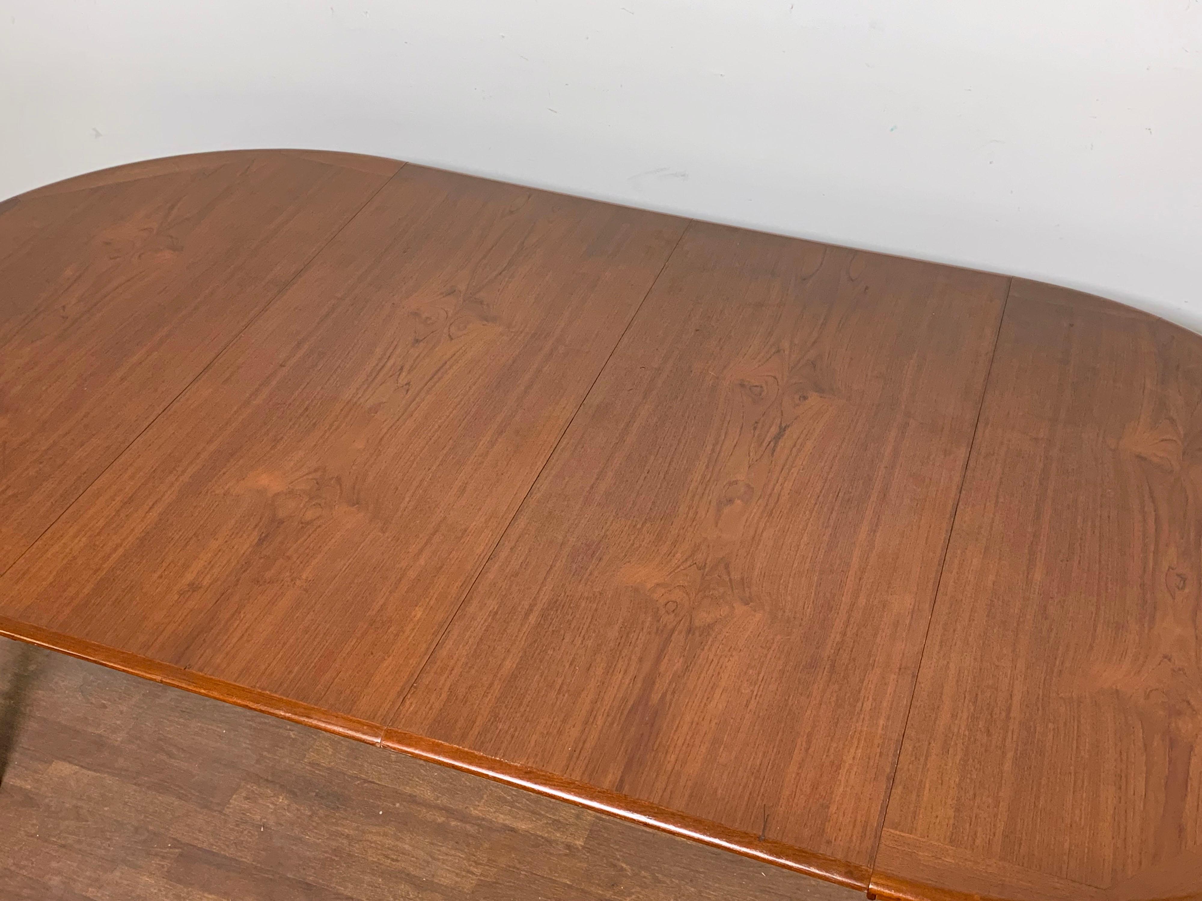 Mid-20th Century Danish Modern Round Teak Dining Table with Two Leaves, Circa 1960s