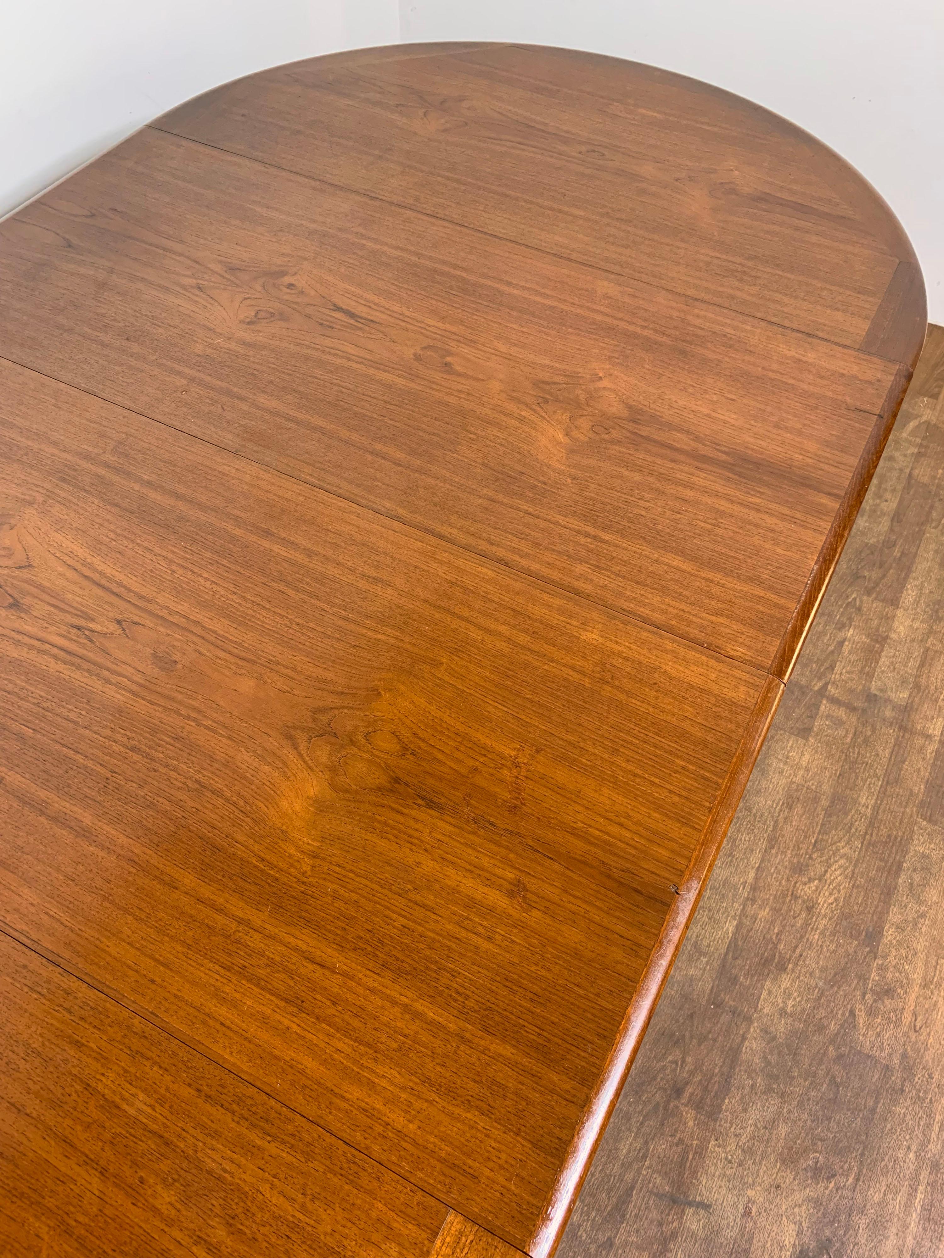 Danish Modern Round Teak Dining Table with Two Leaves, Circa 1960s 2