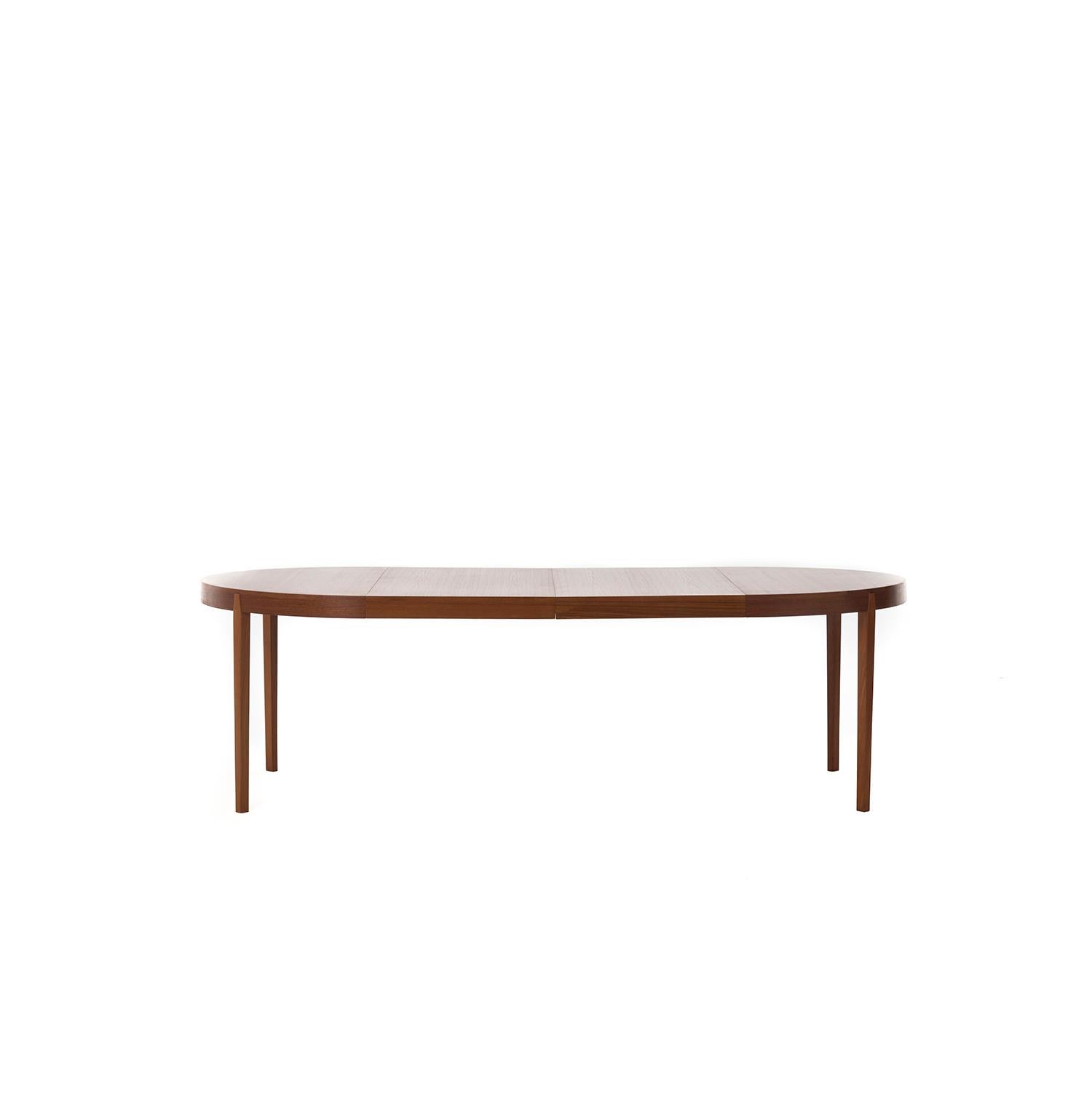 Oiled Danish Modern Round to Oval Dining Table with Two Leaves