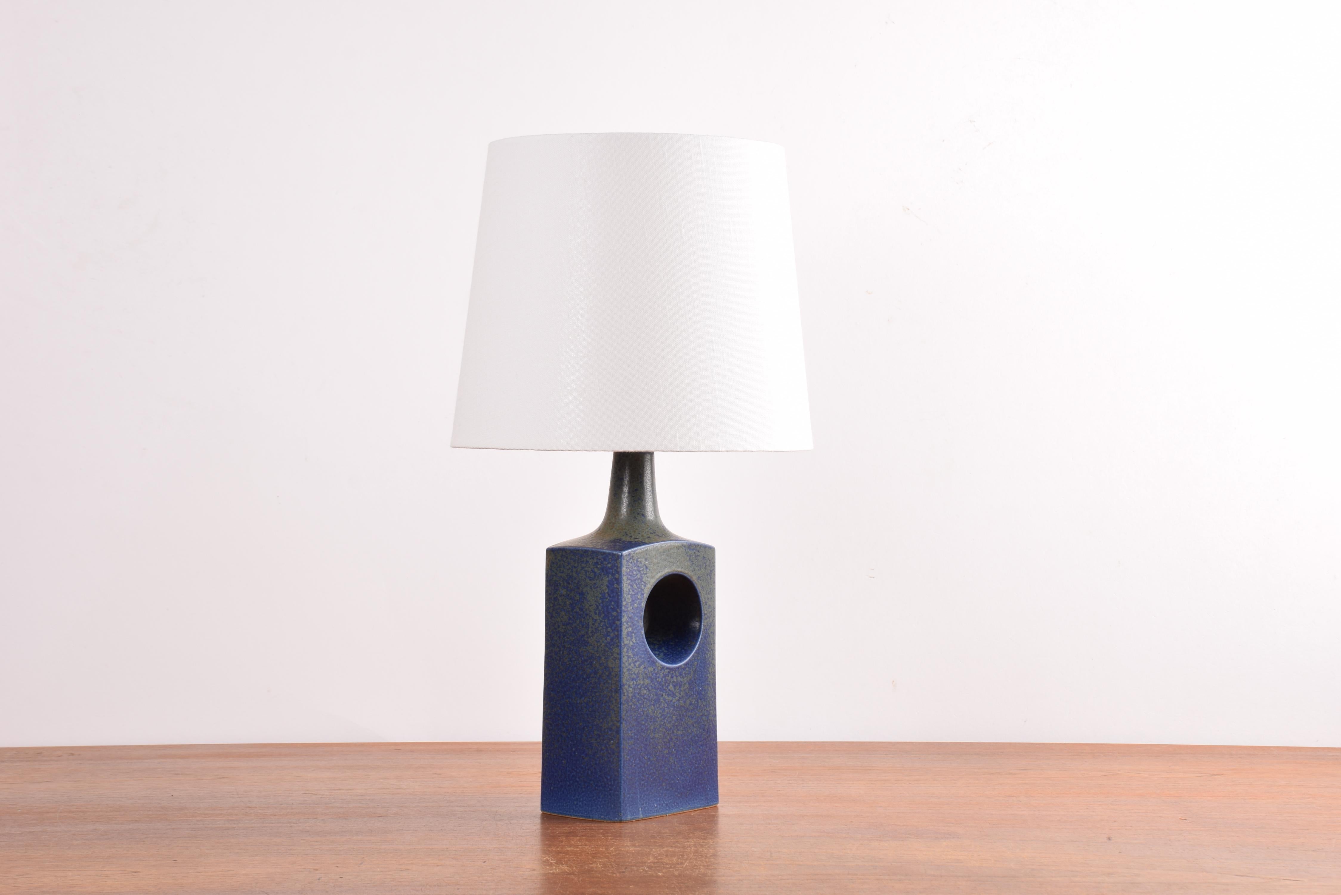 Midcentury Danish table lamp from the ceramic workshop Knabstrup. Made circa 1960s.
This lamp is from the Knabstrup Atelier series. The design could be by Richard Manz.

The lamp has an interesting glaze in blue with olive green areas and