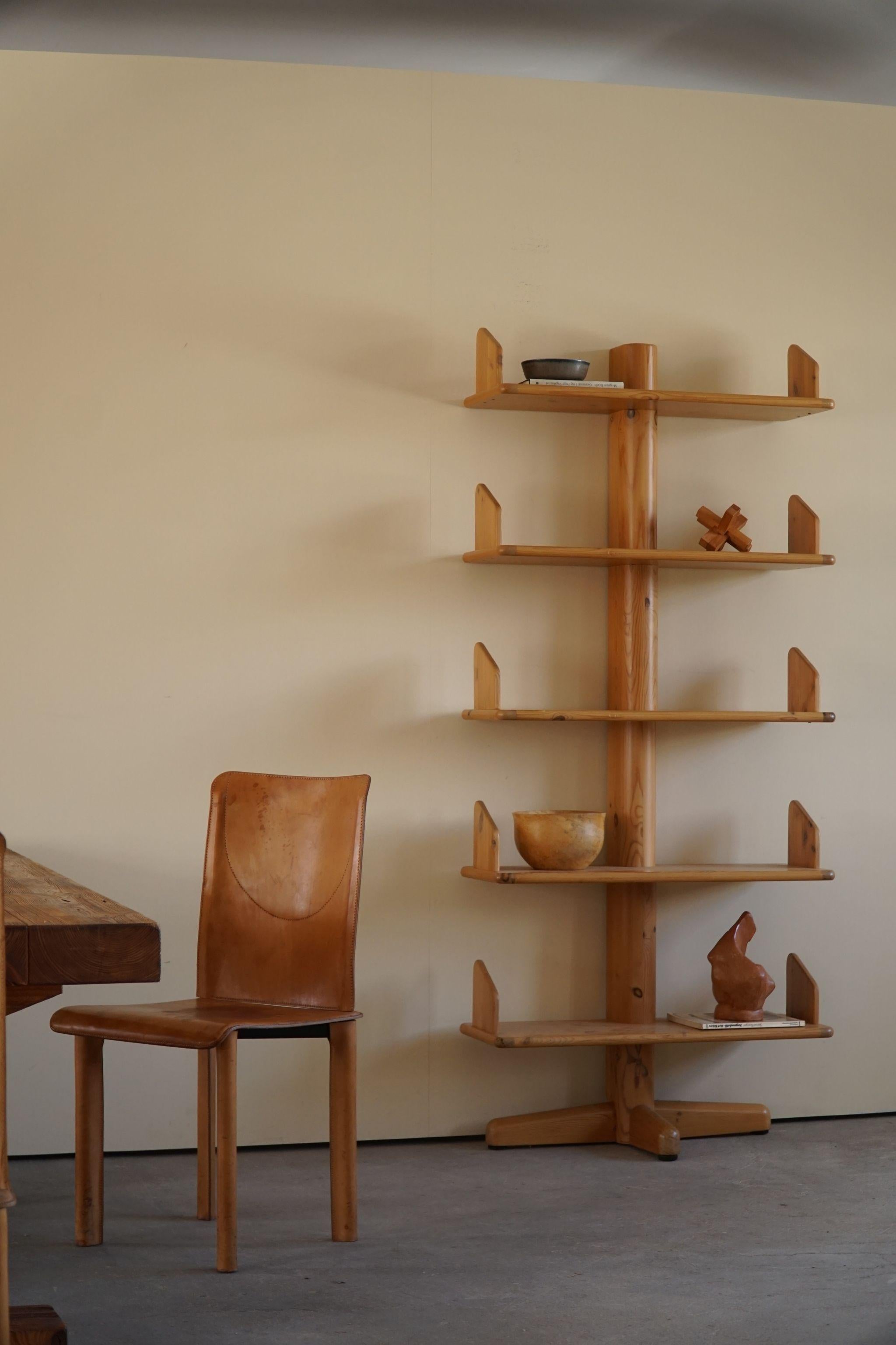 Rare freestanding shelving unit in solid pine. Designed by Rainer Daumiller for Hirtshals Savvaerk. Ca 1970s. 
A rare object with beautiful wood grains.

This vintage object is in a really good condition, with minimal signs of wear.

This