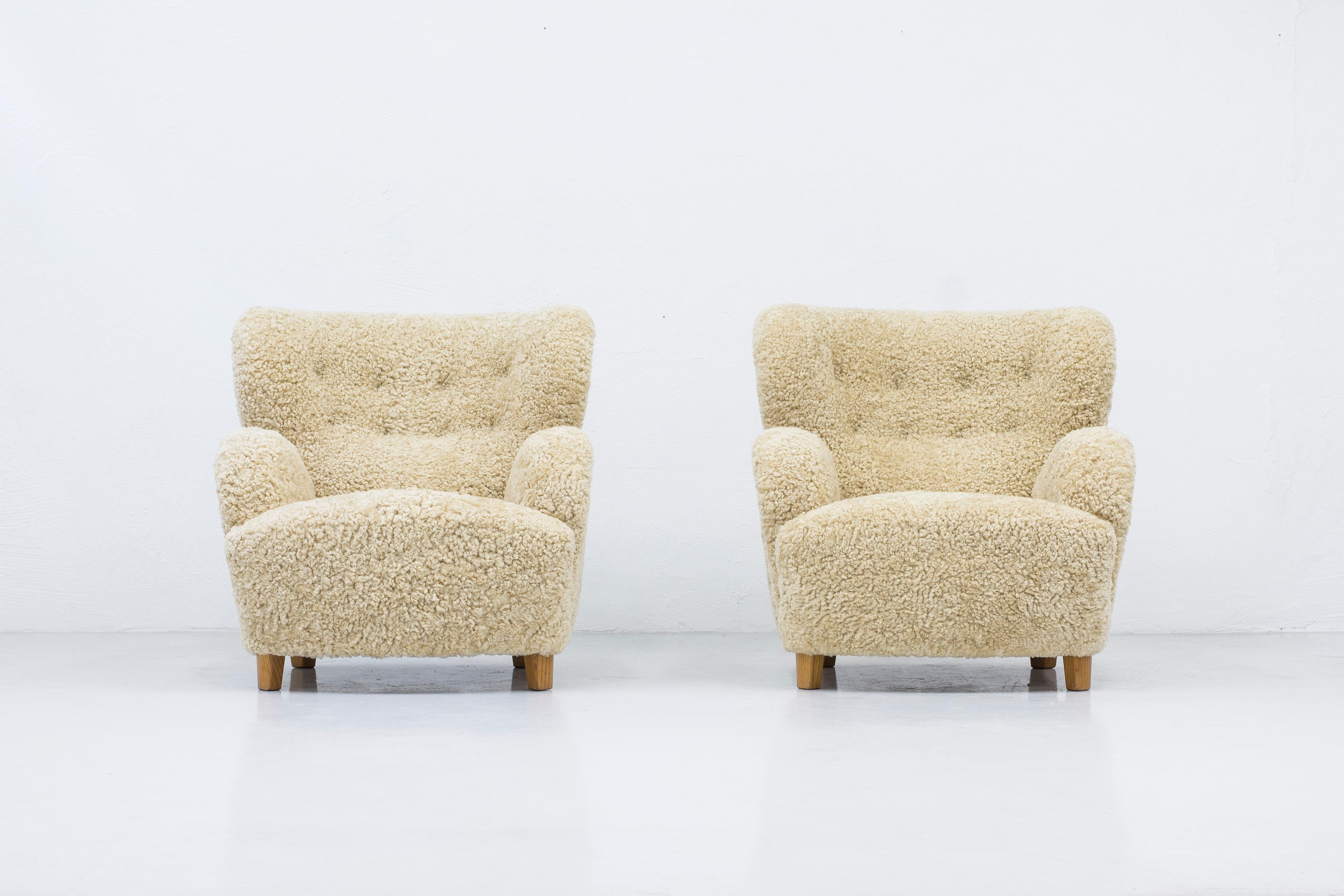 Danish modern sheepskin lounge chairs in the style of Flemming Lassen 8