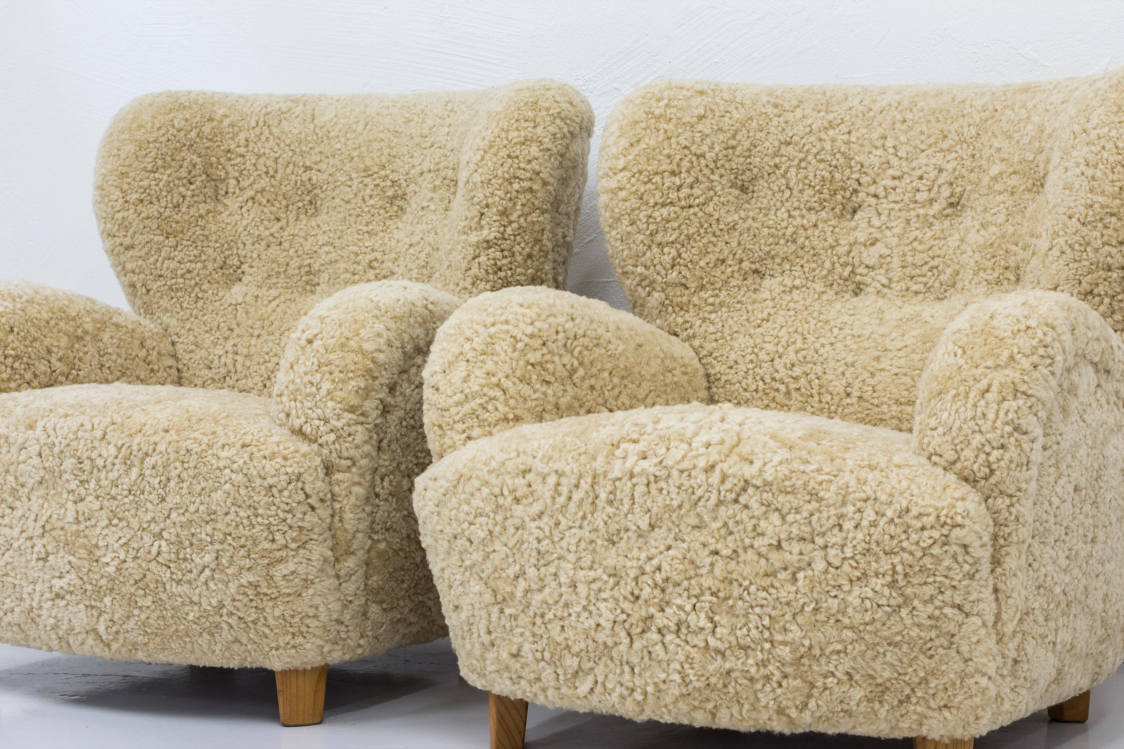 Sheepskin Danish modern sheepskin lounge chairs in the style of Flemming Lassen