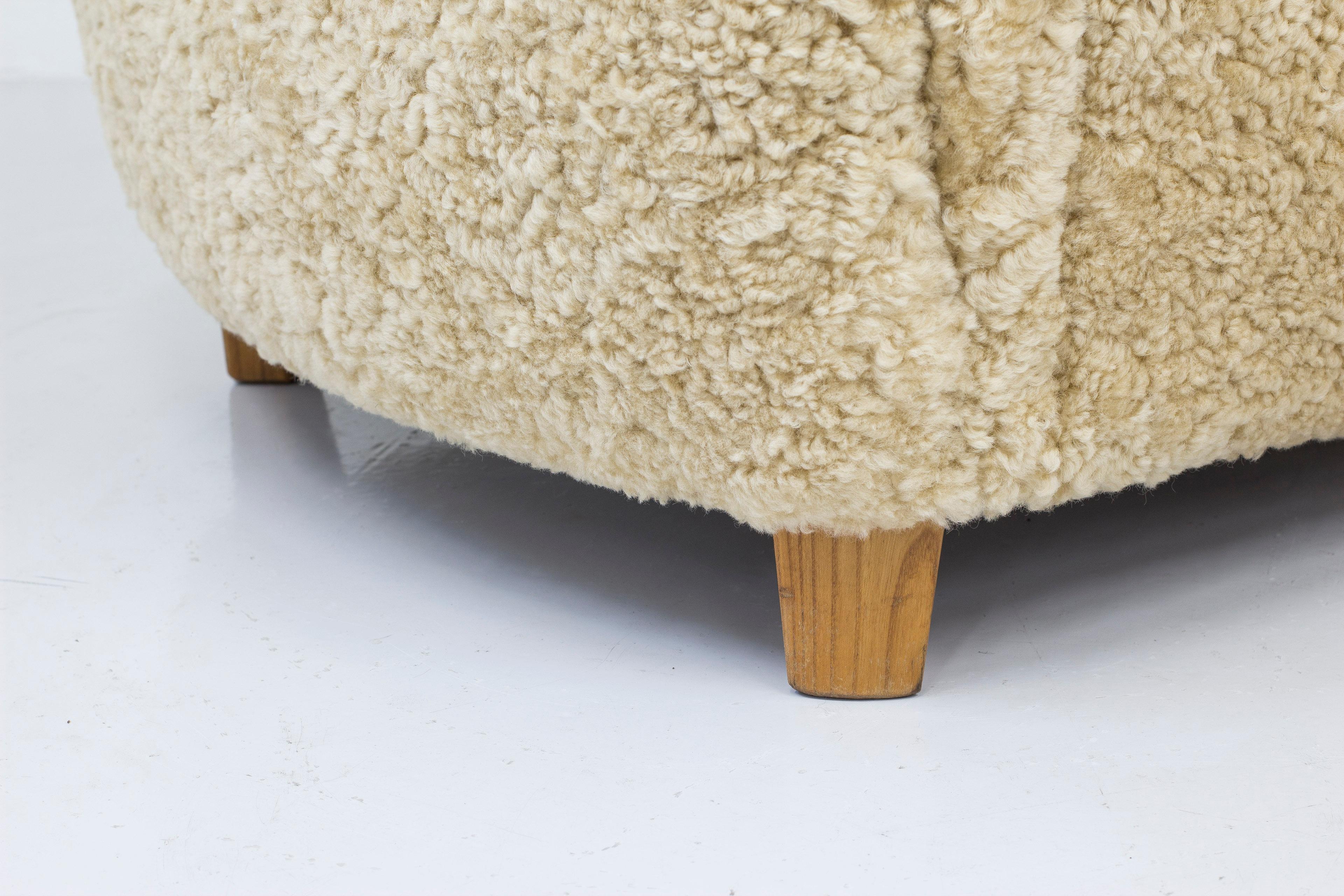Danish modern sheepskin lounge chairs in the style of Flemming Lassen 3
