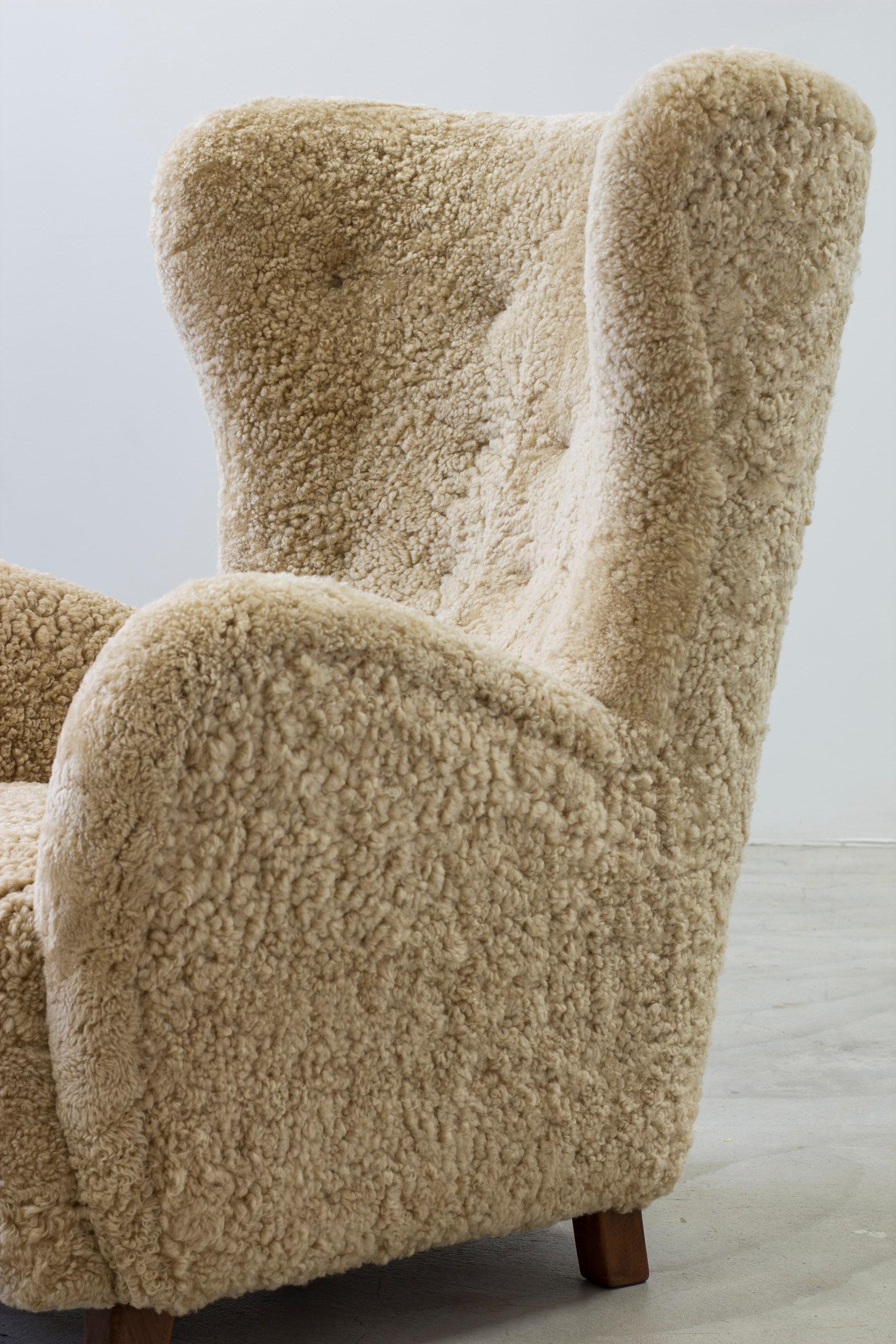 Danish modern sheepskin Wing back chair in the style of Lassen, Denmark 7