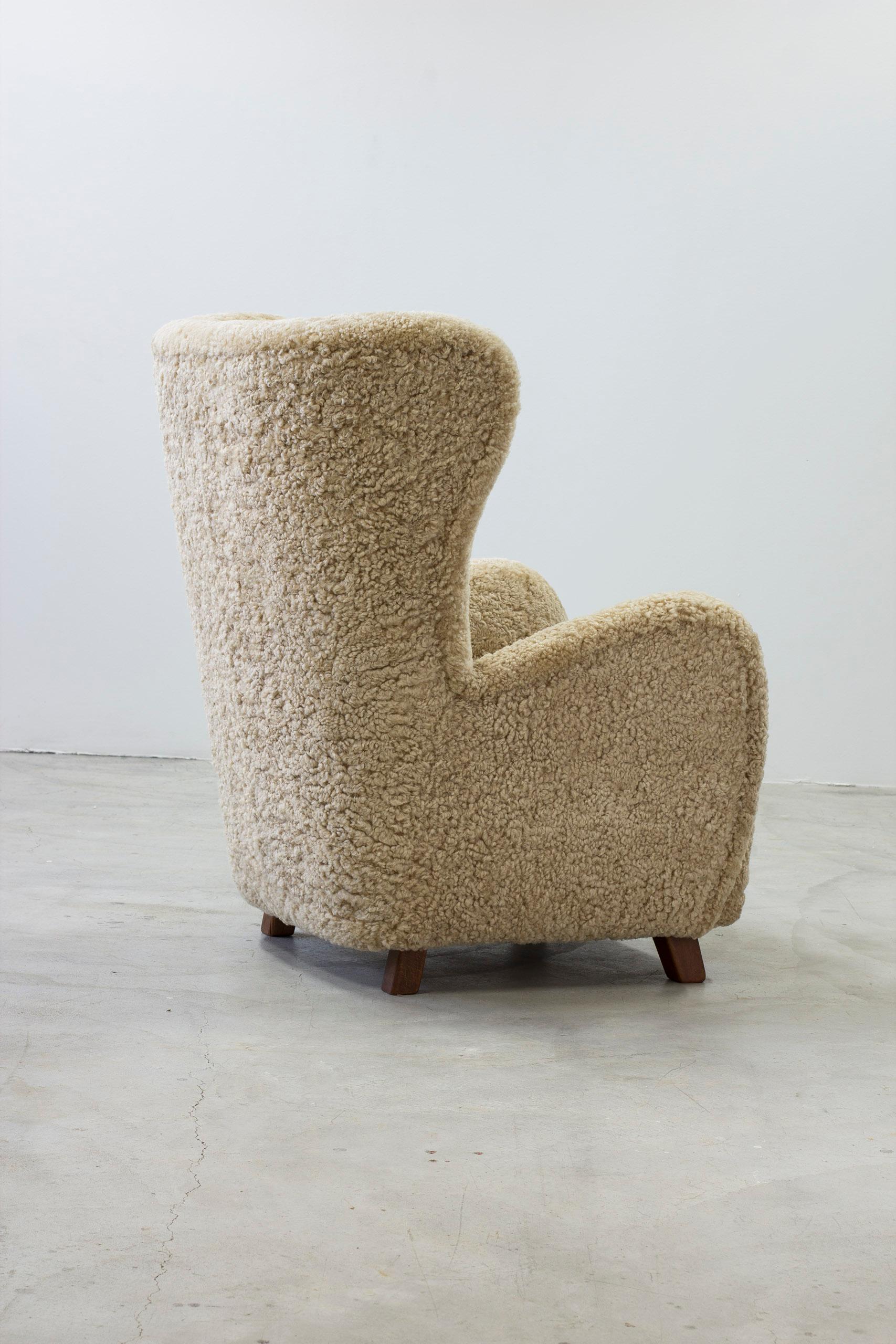 Danish modern sheepskin Wing back chair in the style of Lassen, Denmark 2