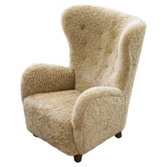 Danish modern sheepskin Wing back chair in the style of Lassen, Denmark