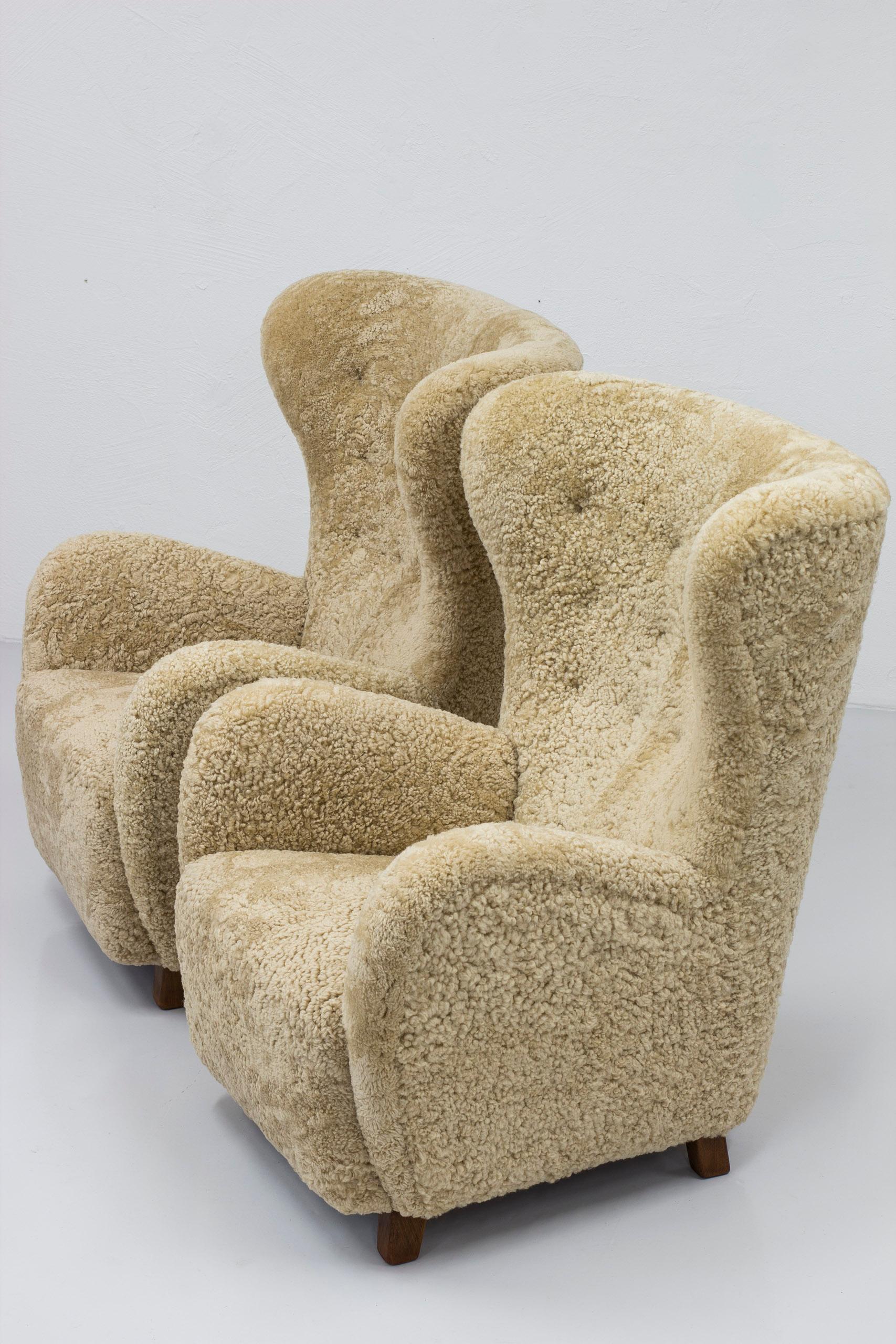 Danish modern sheepskin Wing back chairs attributed to Flemming Lassen, Denmark  For Sale 6