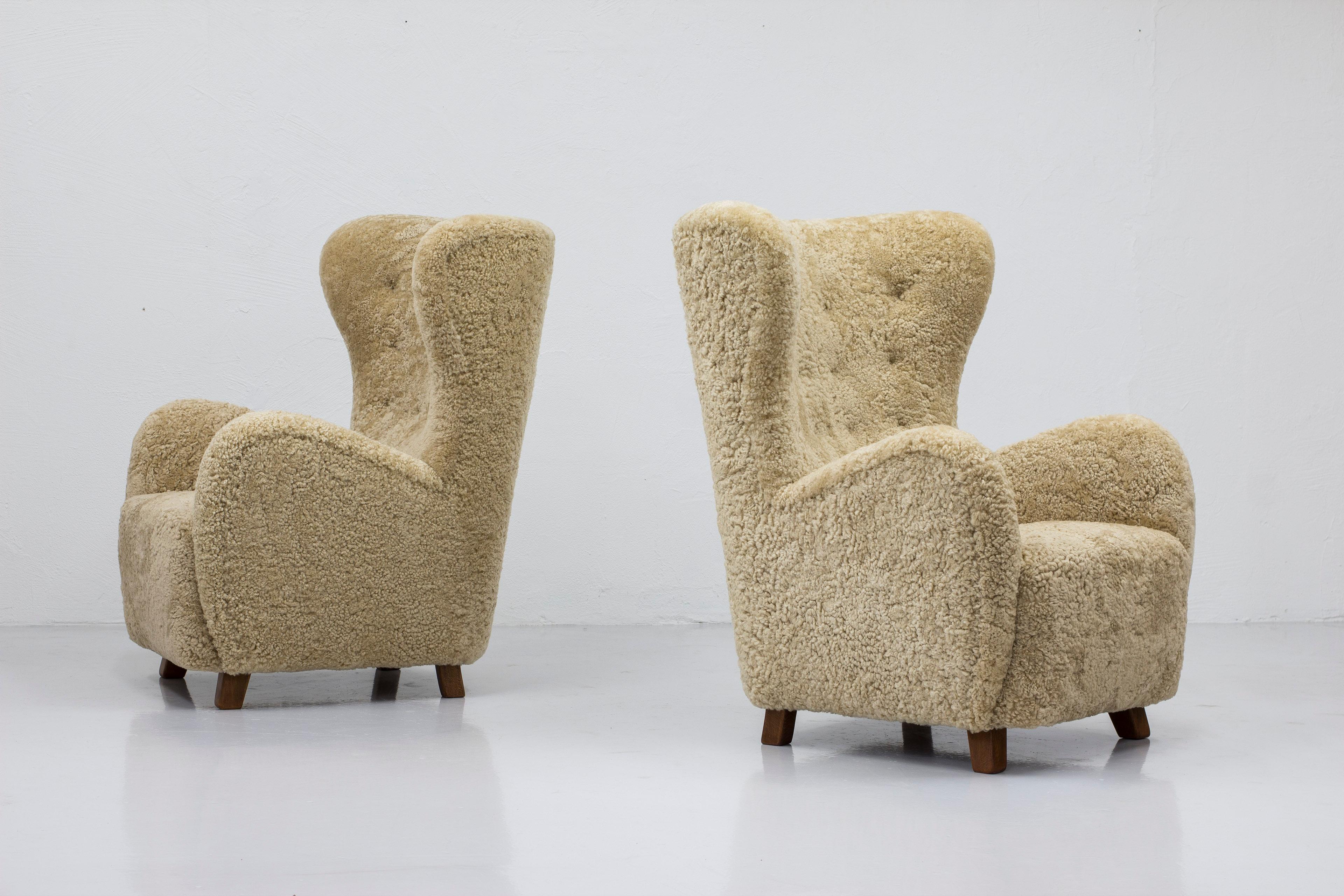 Danish modern sheepskin Wing back chairs attributed to Flemming Lassen, Denmark  For Sale 7