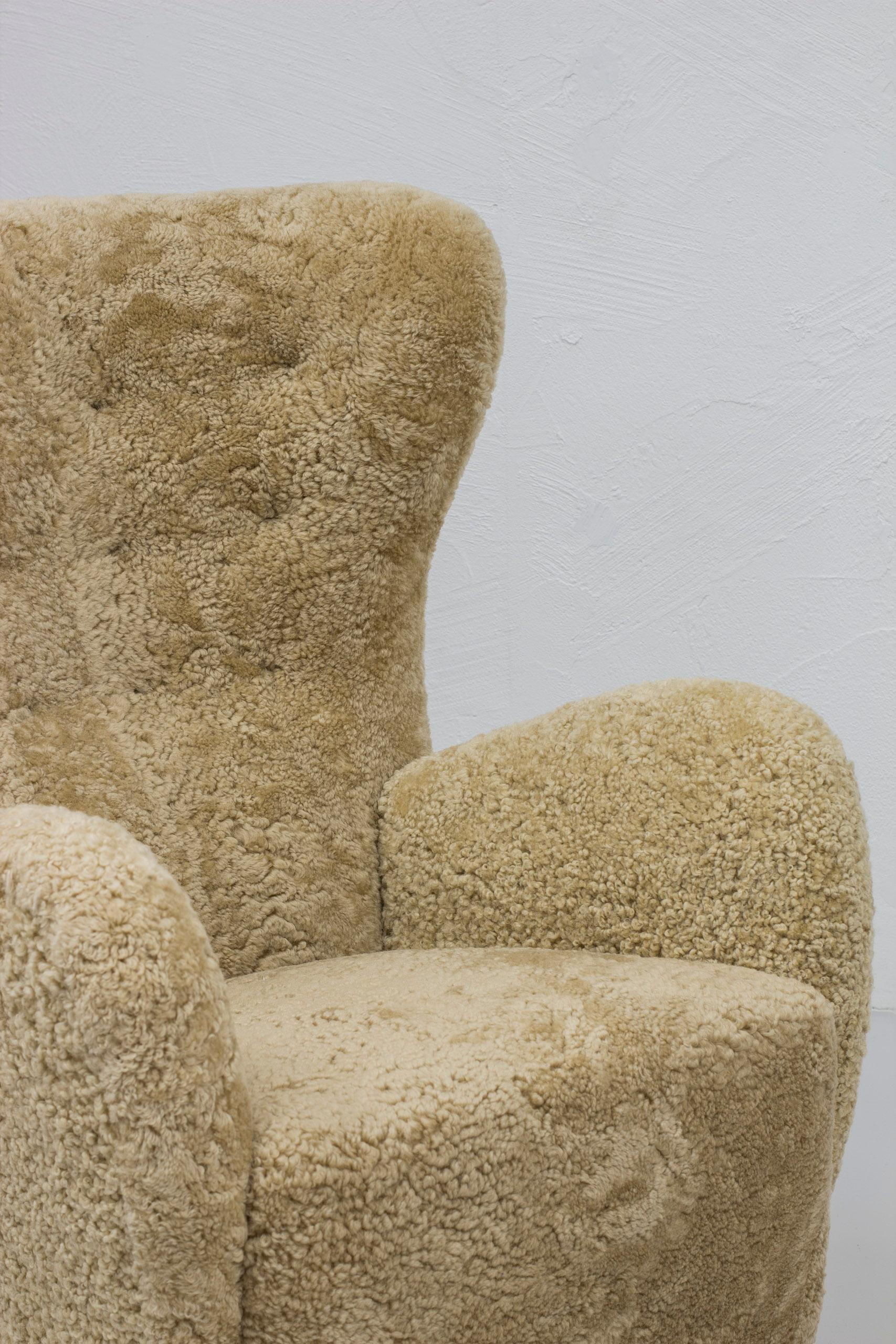 Danish modern sheepskin Wing back chairs attributed to Flemming Lassen, Denmark  For Sale 2