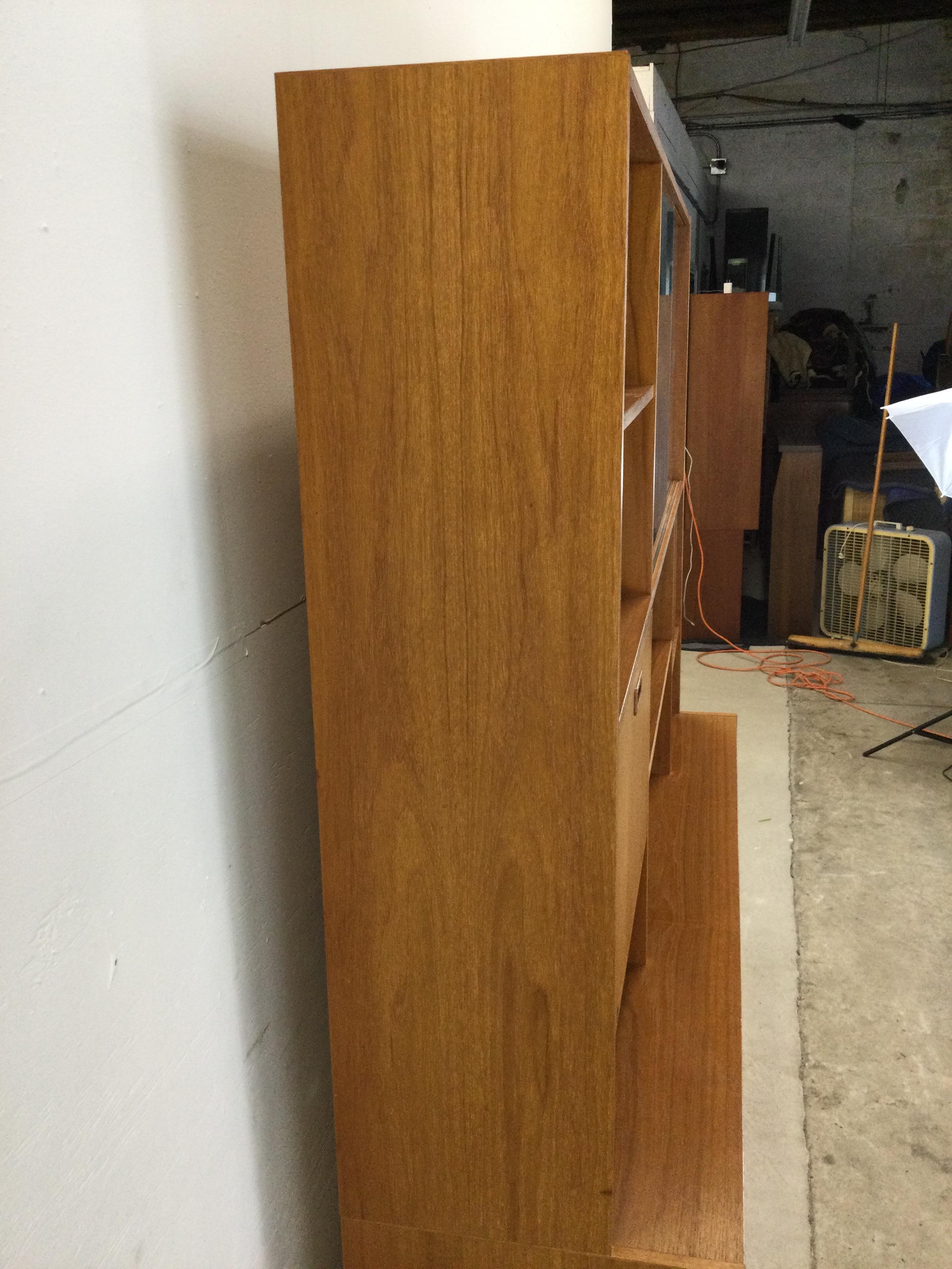 Danish modern shelving unit with sliding glass doors and drop front cabinet 9